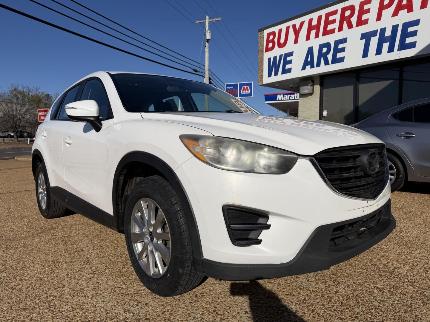 2016 WHITE /Grey MAZDA CX-5 SPORT Sport (JM3KE2BY6G0) with an 2.5L L4 DOHC 16V engine, 6-Speed Automatic transmission, located at 922 W. Beacon St., Philadelphia, MS, 39350, (601) 650-3675, 32.770447, -89.127151 - Title: 2016 Mazda CX-5 Sport AT Year: 2016 Make: Mazda Model: CX-5 Engine: 2.5L L4 DOHC 16V Body: SPORT UTILITY 4-DR Transmission: 6-Speed Automatic Drive Type: FWD Mpg City: 26 Mpg: 33 Trim: Sport AT - Photo#0