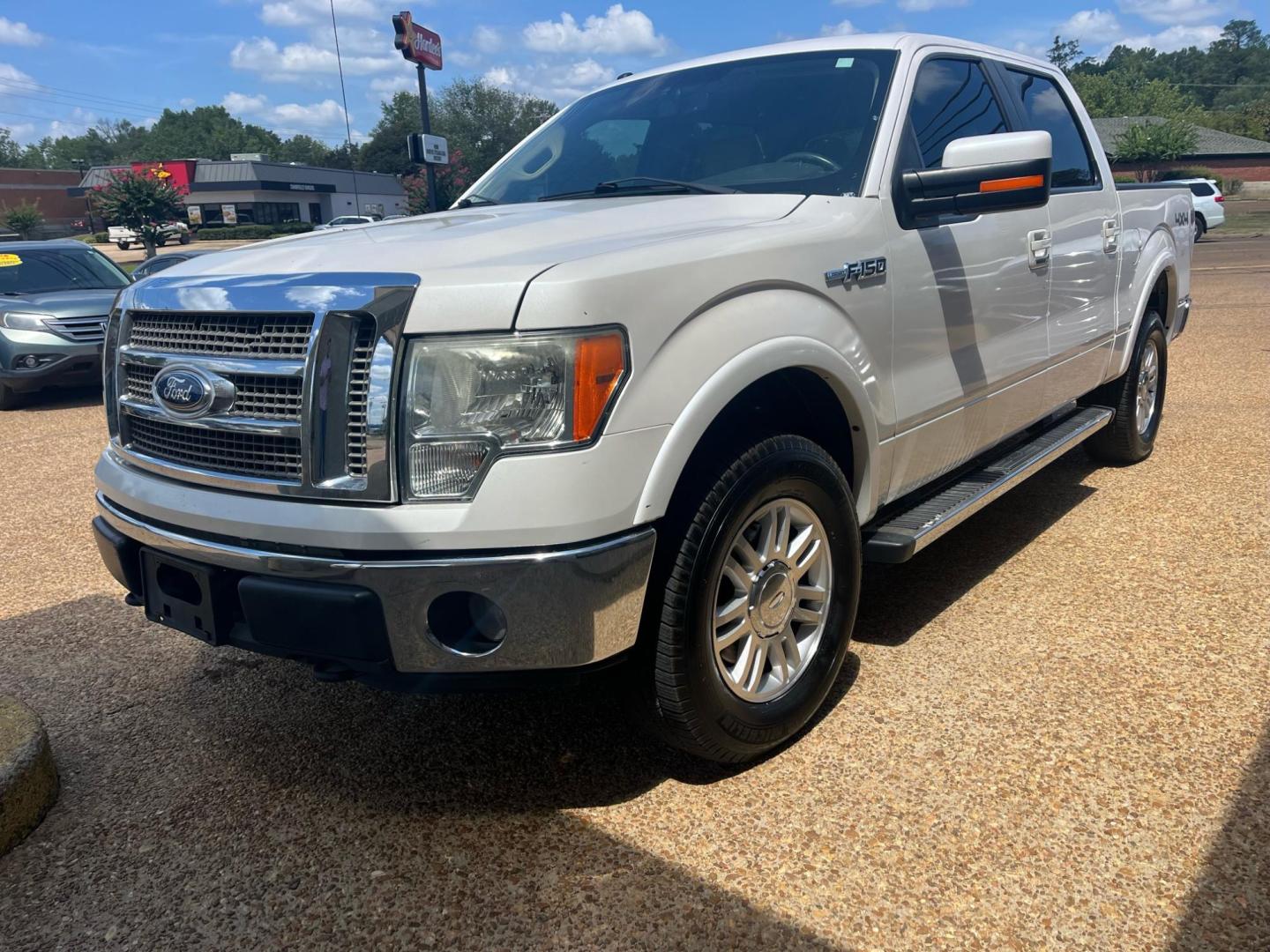 2011 WHITE FORD F-150 XL; PLATINUM; PLATINUM (1FTFW1EF1BK) with an 5.0L DOHC 32V V8 engine, 6-Speed Automatic transmission, located at 922 W. Beacon St., Philadelphia, MS, 39350, (601) 650-3675, 32.770447, -89.127151 - Title: 2011 Ford F-150 FX4 Year: 2011 Make: Ford Model: F-150 Engine: 5.0L V8 Body: CREW CAB Transmission: 4-Speed Automatic Drive Type: 4WD Trim: Platinum Super Crew - Photo#1