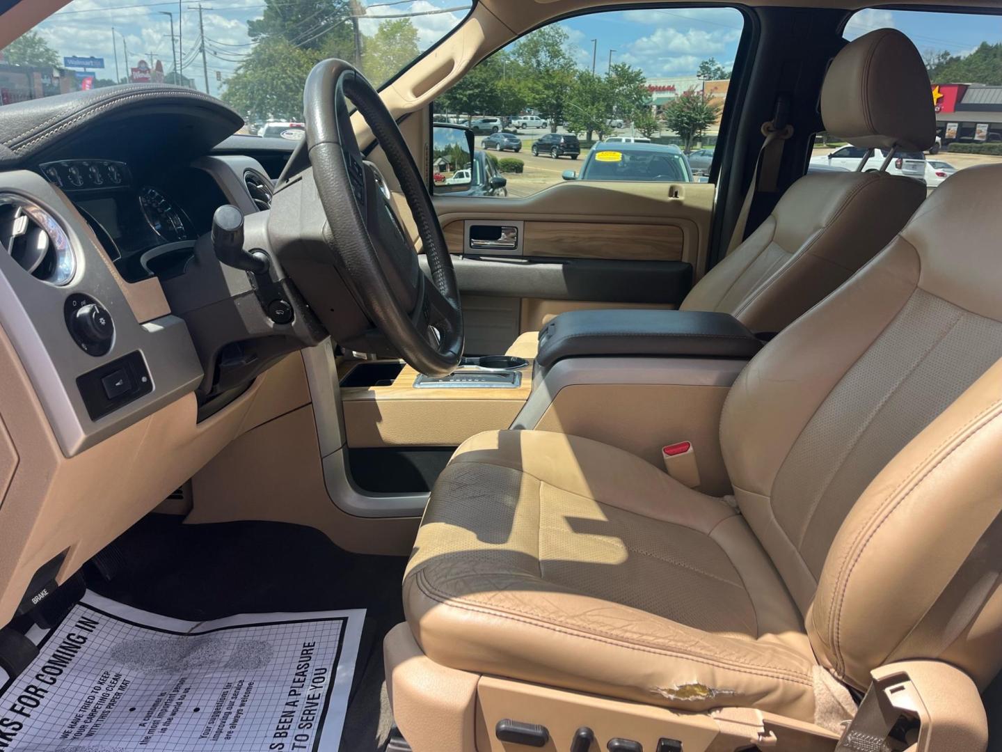 2011 WHITE FORD F-150 XL; PLATINUM; PLATINUM (1FTFW1EF1BK) with an 5.0L DOHC 32V V8 engine, 6-Speed Automatic transmission, located at 922 W. Beacon St., Philadelphia, MS, 39350, (601) 650-3675, 32.770447, -89.127151 - Title: 2011 Ford F-150 FX4 Year: 2011 Make: Ford Model: F-150 Engine: 5.0L V8 Body: CREW CAB Transmission: 4-Speed Automatic Drive Type: 4WD Trim: Platinum Super Crew - Photo#6
