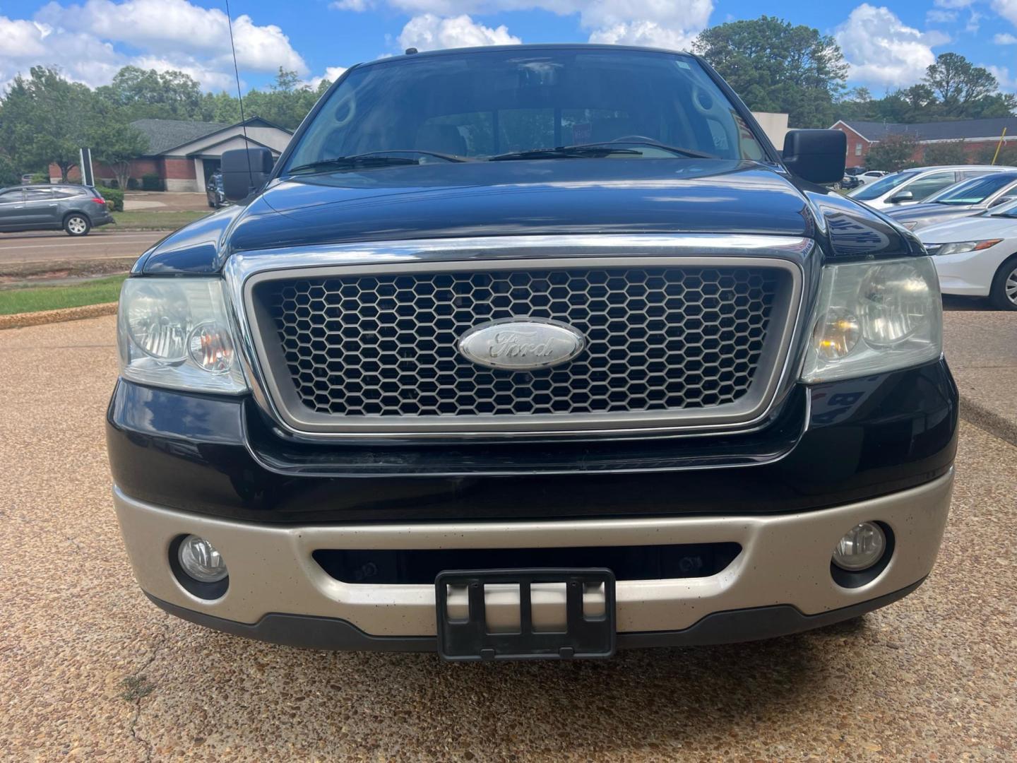 2008 BLACK FORD F-150 XLT; FX2; LARI Limited (1FTPW12V28K) with an 5.4L V8 SOHC 24V FFV engine, 4-Speed Automatic transmission, located at 922 W. Beacon St., Philadelphia, MS, 39350, (601) 650-3675, 32.770447, -89.127151 - Title: 2008 Ford F-150 Lariat Super Crew Year: 2008 Make: Ford Model: F-150 Engine: 5.4L V8 SOHC 24V FFV Body: CREW CAB PICKUP 4-DR Transmission: 4-Speed Automatic Overdrive Drive Type: RWD Trim: Lariat SuperCrew - Photo#1