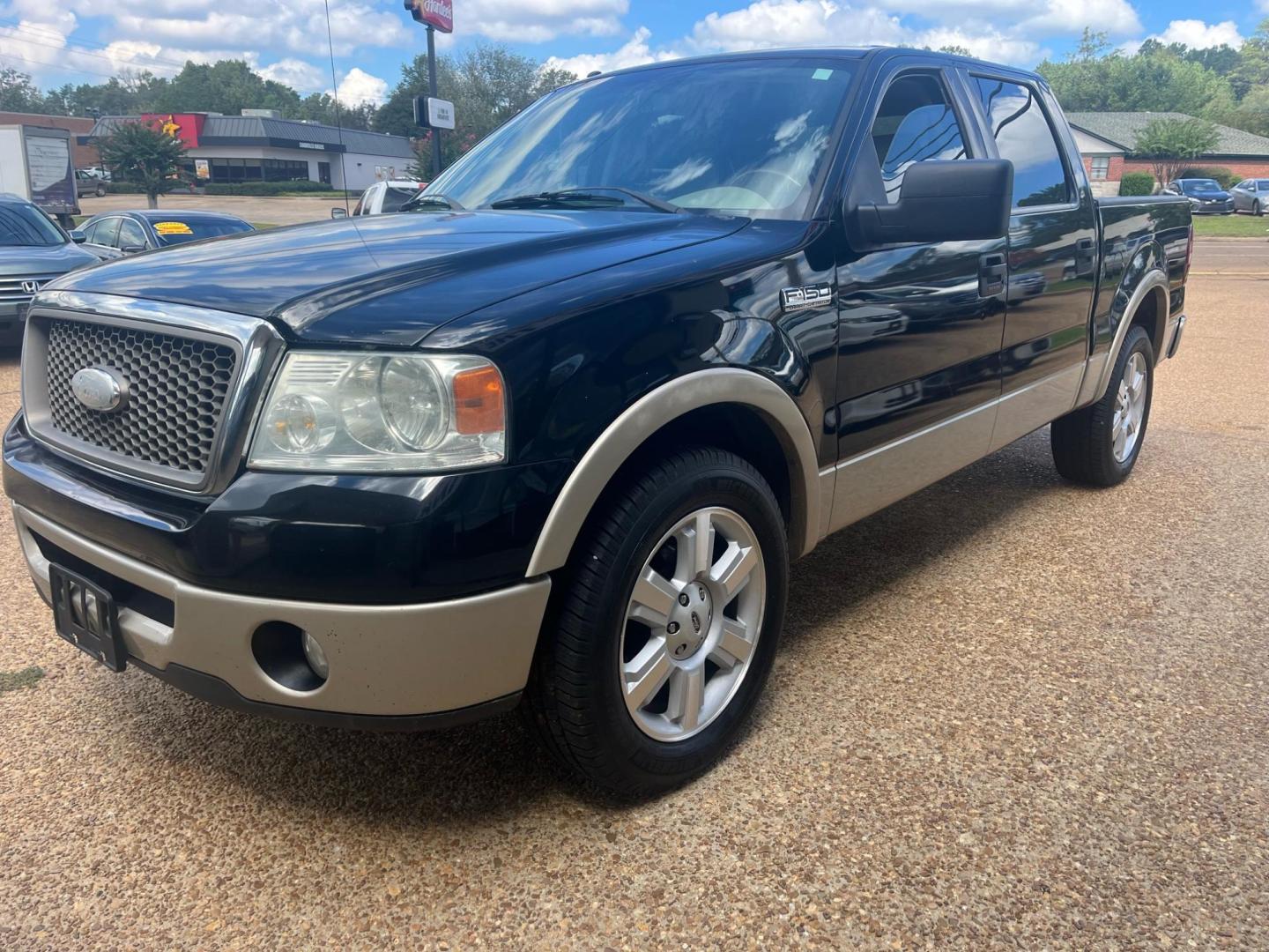 2008 BLACK FORD F-150 XLT; FX2; LARI Limited (1FTPW12V28K) with an 5.4L V8 SOHC 24V FFV engine, 4-Speed Automatic transmission, located at 922 W. Beacon St., Philadelphia, MS, 39350, (601) 650-3675, 32.770447, -89.127151 - Title: 2008 Ford F-150 Lariat Super Crew Year: 2008 Make: Ford Model: F-150 Engine: 5.4L V8 SOHC 24V FFV Body: CREW CAB PICKUP 4-DR Transmission: 4-Speed Automatic Overdrive Drive Type: RWD Trim: Lariat SuperCrew - Photo#2
