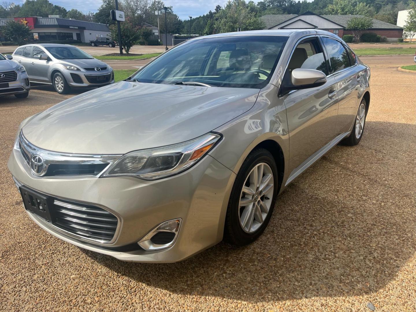 2013 TAN TOYOTA AVALON LIMITED; XLE; (4T1BK1EB7DU) , located at 922 W. Beacon St., Philadelphia, MS, 39350, (601) 650-3675, 32.770447, -89.127151 - Photo#1