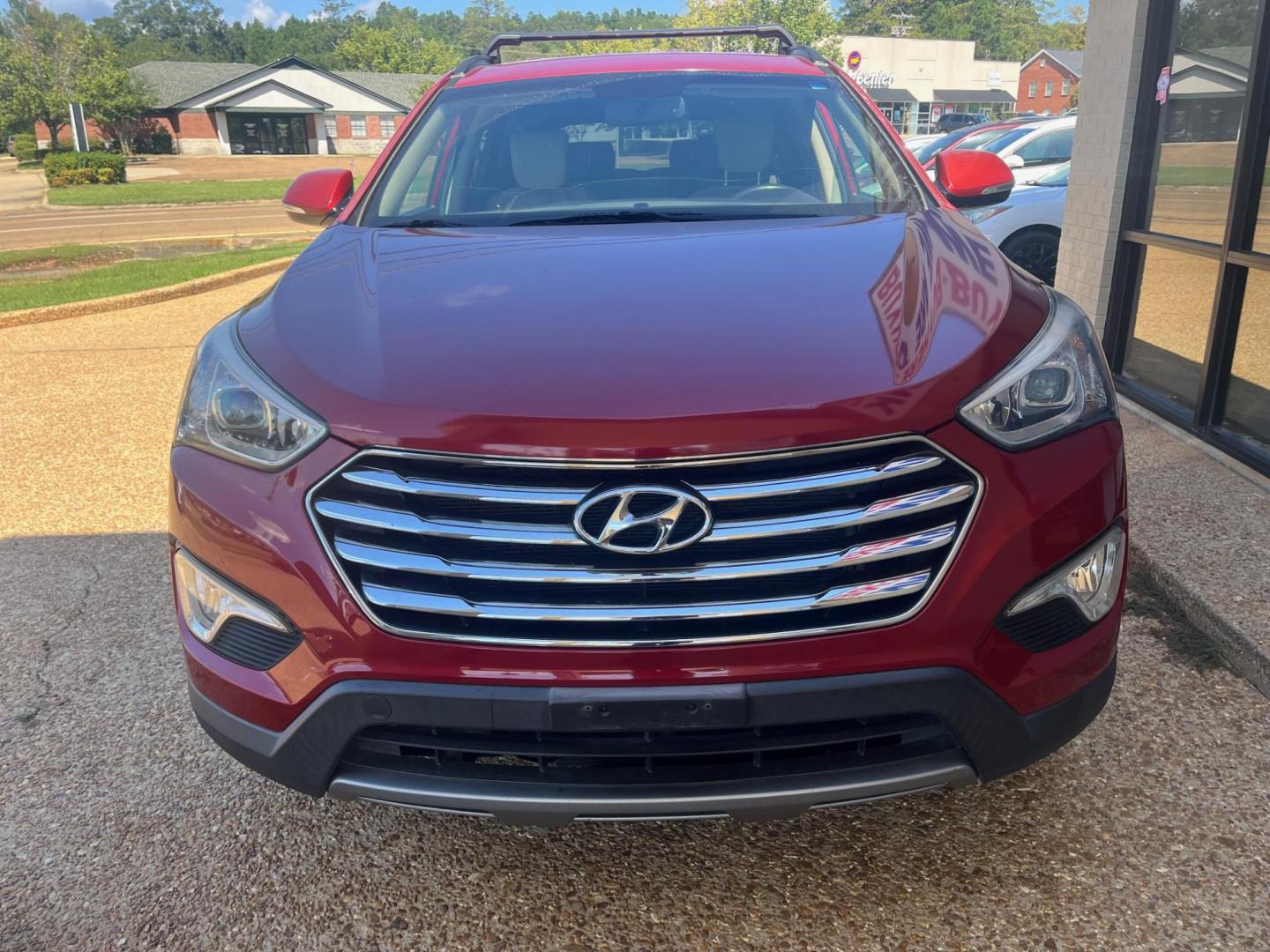 2014 RED HYUNDAI SANTA FE GLS Limited (KM8SN4HF5EU) with an 3.3L V6 DOHC 24V engine, 6-Speed Automatic transmission, located at 922 W. Beacon St., Philadelphia, MS, 39350, (601) 650-3675, 32.770447, -89.127151 - Title: 2014 Hyundai Santa Fe GLS FWD Year: 2014 Make: Hyundai Model: Santa Fe Engine: 3.3L V6 DOHC 24V Body: SPORT UTILITY 4-DR Transmission: 6-Speed Automatic Drive Type: FWD Mpg City: 18 Mpg: 25 Trim: GLS FWD - Photo#2