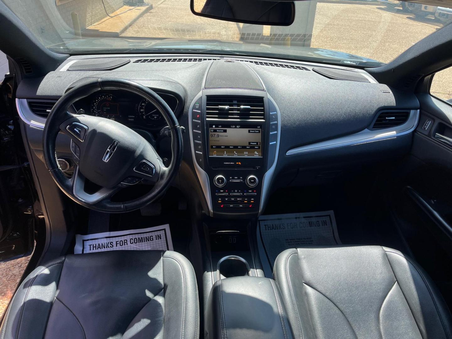 2017 BLACK /Black leather LINCOLN MKC PREMIER Limited (5LMCJ1C95HU) with an 2.0L L4 DOHC 16V engine, 6-Speed Automatic transmission, located at 922 W. Beacon St., Philadelphia, MS, 39350, (601) 650-3675, 32.770447, -89.127151 - Title: 2017 Lincoln MKC Premiere Year: 2017 Make: Lincoln Model: MKC Engine: 2.0L L4 DOHC 16V Body: SPORT UTILITY 4-DR Transmission: 6A Drive Type: FWD Mpg City: 20 Mpg: 29 Trim: Premiere - Photo#6