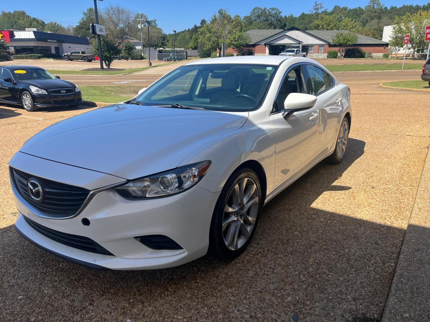 2016 WHITE MAZDA MAZDA6 TOURING I-sport (JM1GJ1V54G1) with an 2.5L L4 DOHC 16V engine, 6-Speed Automatic transmission, located at 922 W. Beacon St., Philadelphia, MS, 39350, (601) 650-3675, 32.770447, -89.127151 - Title: 2016 Mazda6 i Touring Year: 2016 Make: Mazda Model: Mazda6 Engine: 2.5L L4 DOHC 16V Body: HATCHBACK 4-DR Transmission: 6-Speed Automatic Drive Type: FWD Mpg City: 26 Mpg: 38 Trim: i Touring - Photo#2