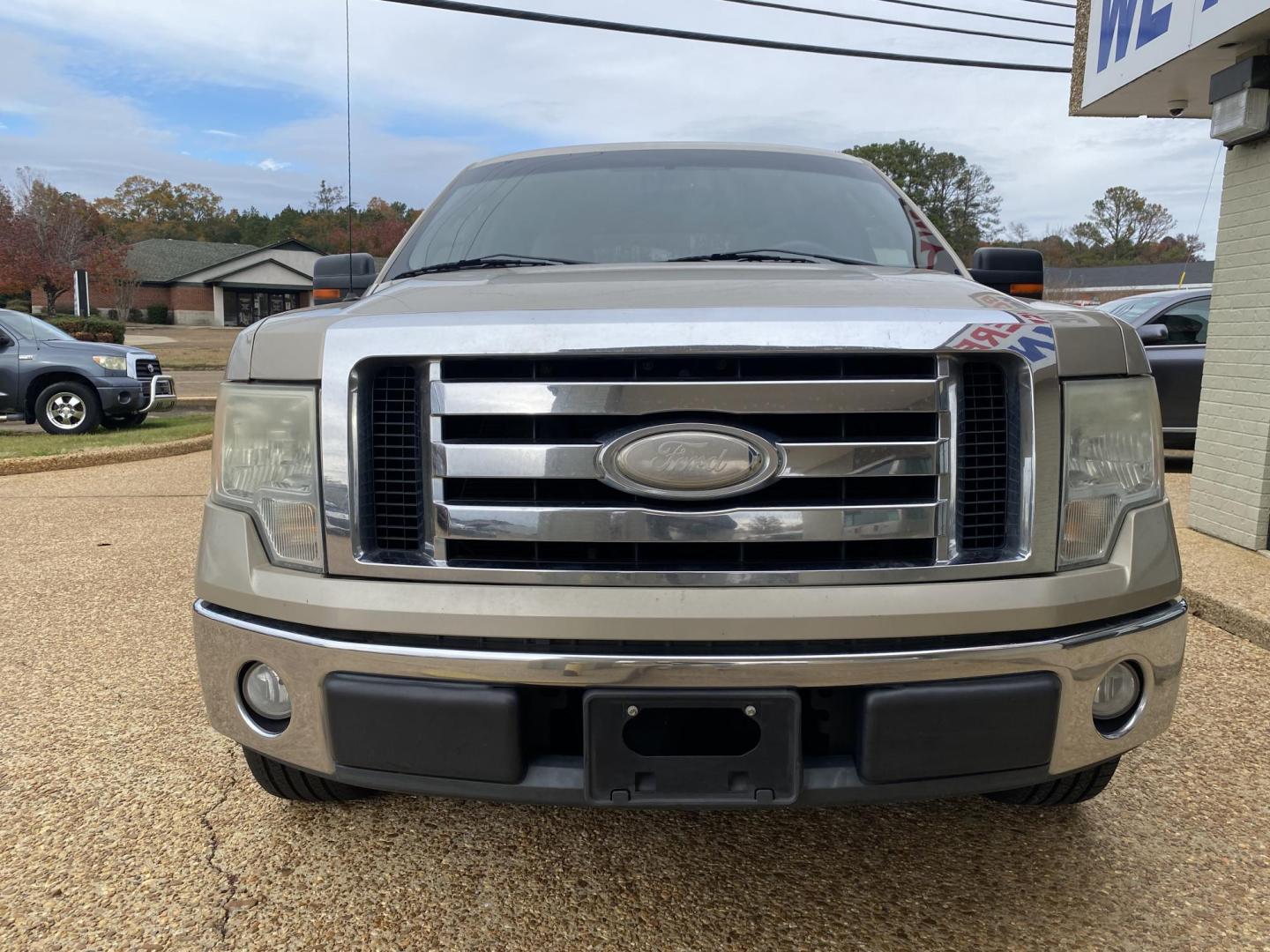 2009 TAN FORD F-150 XLT (1FTRW12849F) , located at 922 W. Beacon St., Philadelphia, MS, 39350, (601) 650-3675, 32.770447, -89.127151 - Photo#1