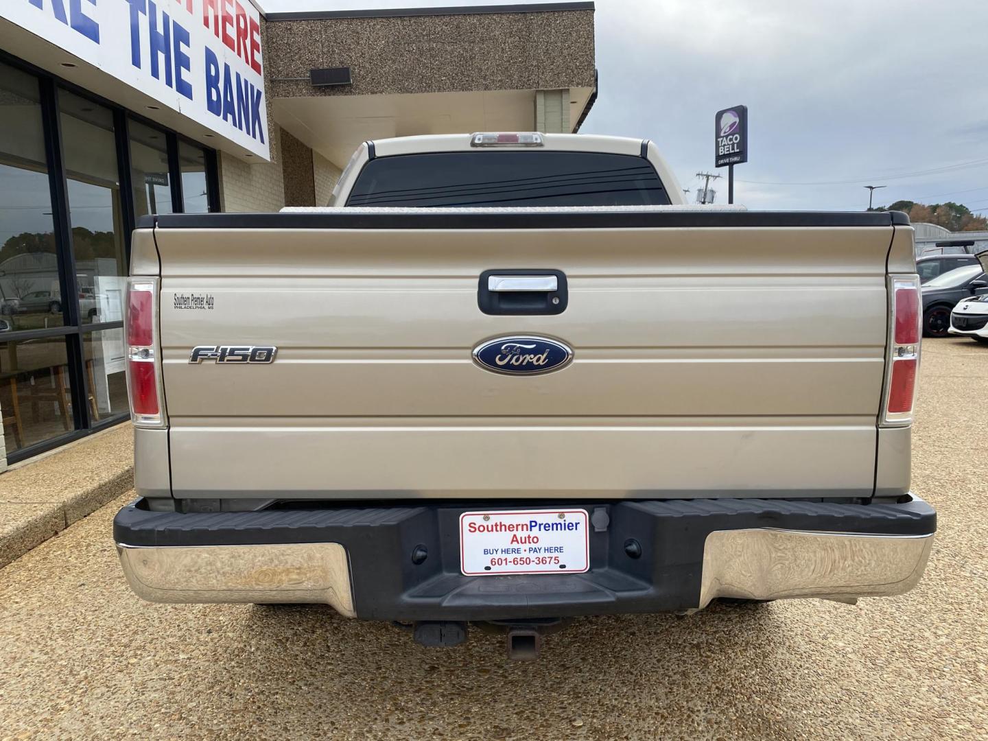 2009 TAN FORD F-150 XLT (1FTRW12849F) , located at 922 W. Beacon St., Philadelphia, MS, 39350, (601) 650-3675, 32.770447, -89.127151 - Photo#4