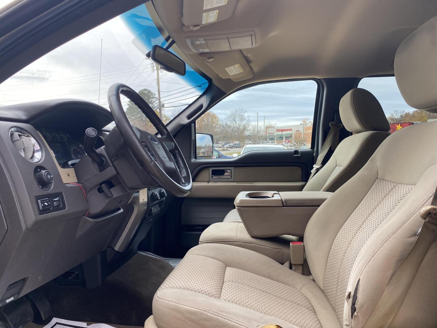 2009 TAN FORD F-150 XLT (1FTRW12849F) , located at 922 W. Beacon St., Philadelphia, MS, 39350, (601) 650-3675, 32.770447, -89.127151 - Photo#8