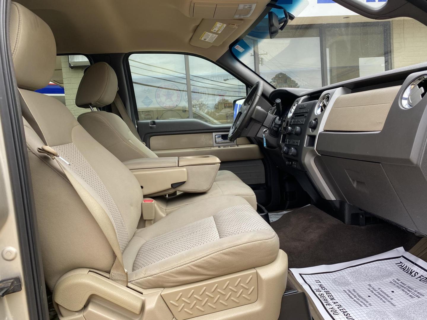 2009 TAN FORD F-150 XLT (1FTRW12849F) , located at 922 W. Beacon St., Philadelphia, MS, 39350, (601) 650-3675, 32.770447, -89.127151 - Photo#11