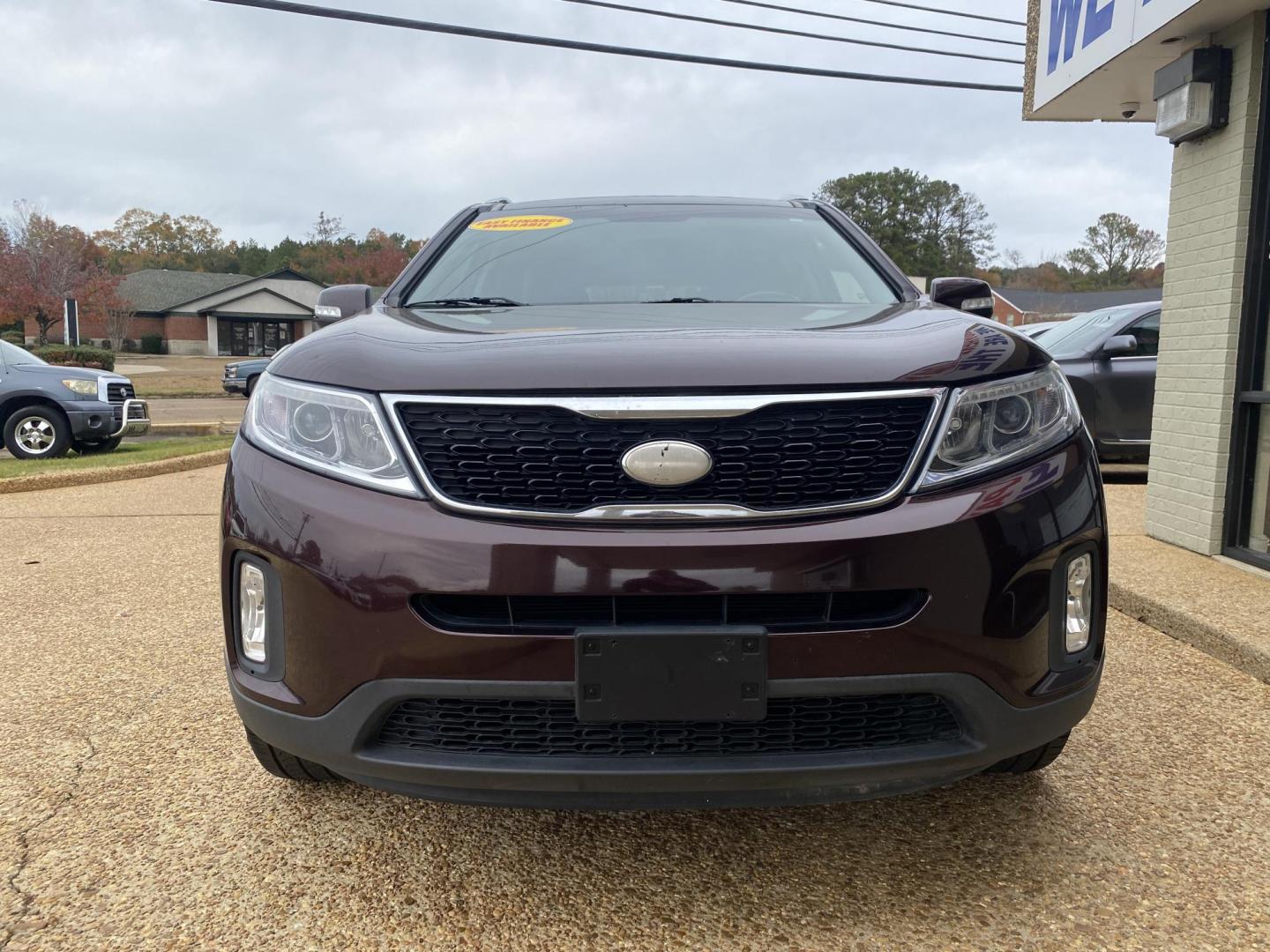 2014 BURGANDY KIA SORENTO EX (5XYKU4A75EG) , located at 922 W. Beacon St., Philadelphia, MS, 39350, (601) 650-3675, 32.770447, -89.127151 - Photo#1