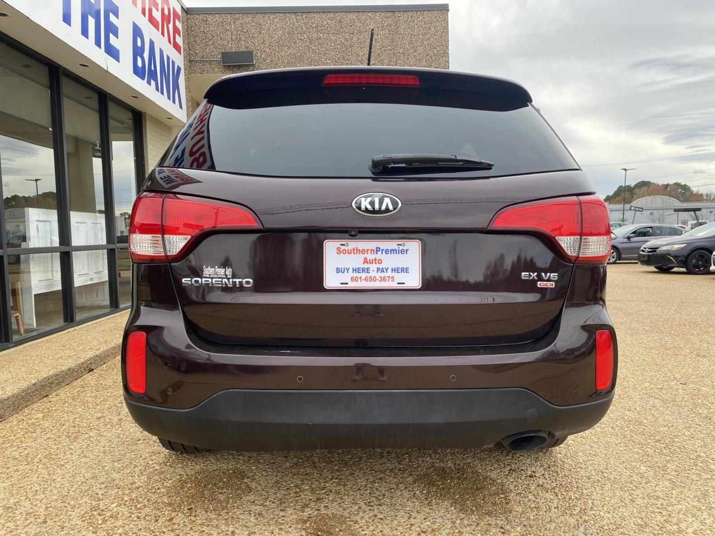 2014 BURGANDY KIA SORENTO EX (5XYKU4A75EG) , located at 922 W. Beacon St., Philadelphia, MS, 39350, (601) 650-3675, 32.770447, -89.127151 - Photo#4