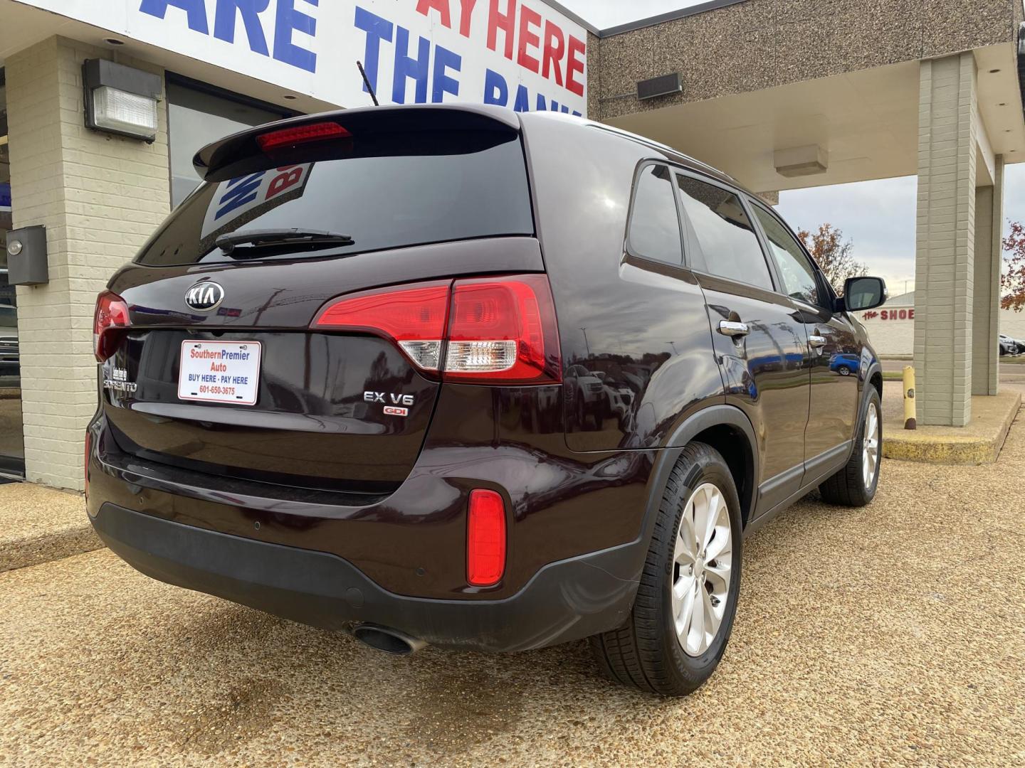 2014 BURGANDY KIA SORENTO EX (5XYKU4A75EG) , located at 922 W. Beacon St., Philadelphia, MS, 39350, (601) 650-3675, 32.770447, -89.127151 - Photo#5