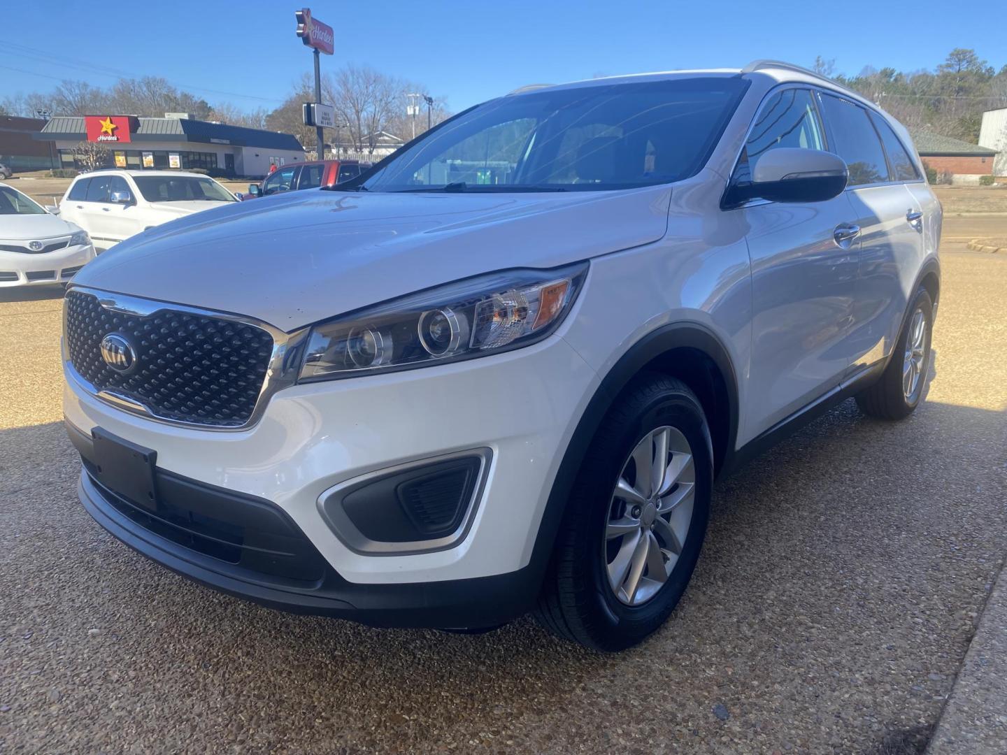 2016 WHITE KIA SORENTO LX; L (5XYPG4A50GG) , located at 922 W. Beacon St., Philadelphia, MS, 39350, (601) 650-3675, 32.770447, -89.127151 - Photo#2