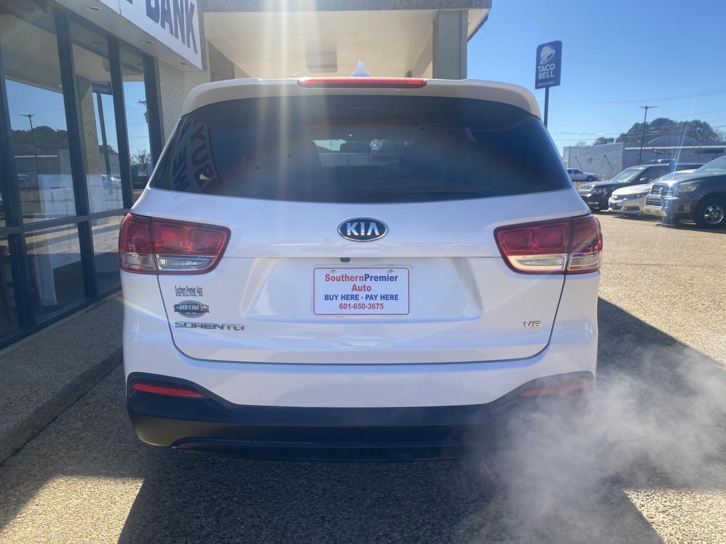 2016 WHITE KIA SORENTO LX; L (5XYPG4A50GG) , located at 922 W. Beacon St., Philadelphia, MS, 39350, (601) 650-3675, 32.770447, -89.127151 - Photo#4