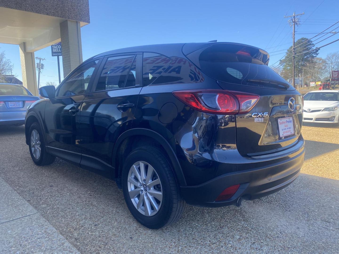 2015 BLACK MAZDA CX-5 SPORT (JM3KE2BE1F0) , located at 922 W. Beacon St., Philadelphia, MS, 39350, (601) 650-3675, 32.770447, -89.127151 - Photo#3