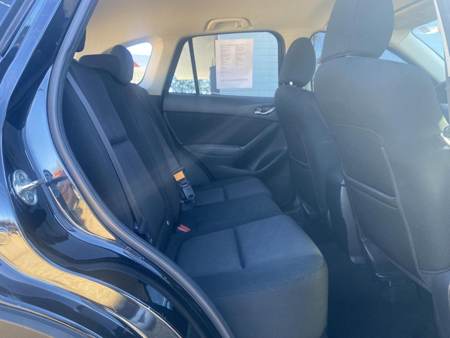 2015 BLACK MAZDA CX-5 SPORT (JM3KE2BE1F0) , located at 922 W. Beacon St., Philadelphia, MS, 39350, (601) 650-3675, 32.770447, -89.127151 - Photo#11