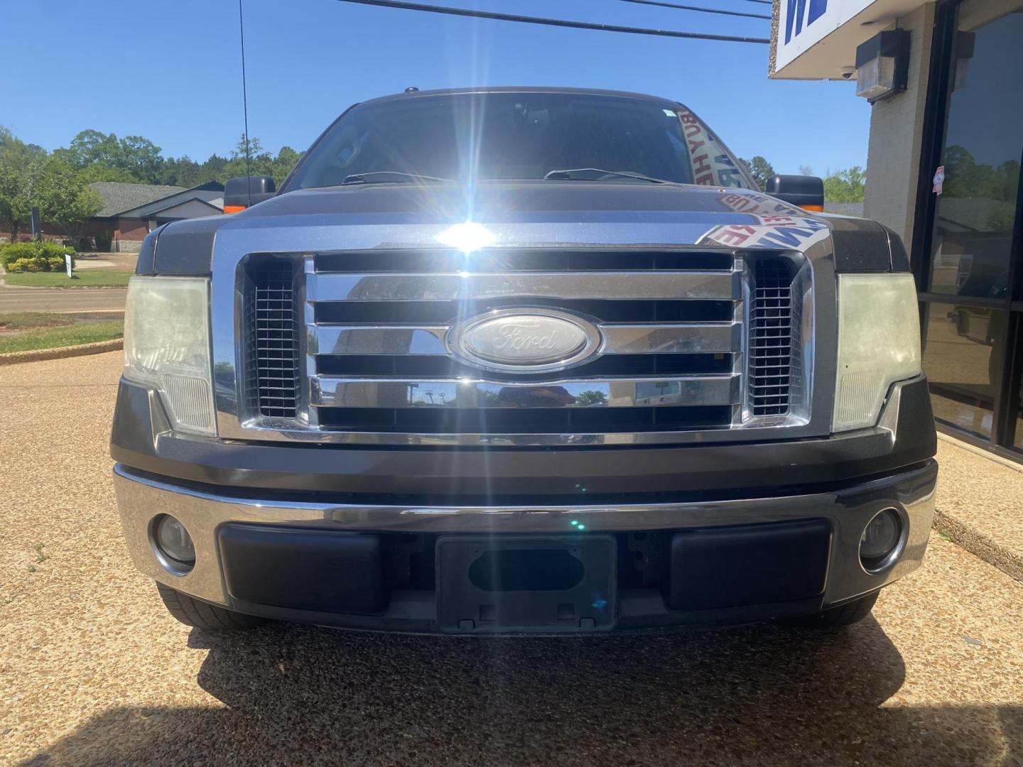 2009 BROWN FORD F-150 XLT (1FTRW12849K) , located at 922 W. Beacon St., Philadelphia, MS, 39350, (601) 650-3675, 32.770447, -89.127151 - Photo#1