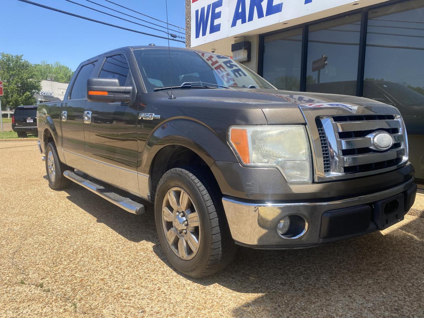 2009 BROWN FORD F-150 XLT (1FTRW12849K) , located at 922 W. Beacon St., Philadelphia, MS, 39350, (601) 650-3675, 32.770447, -89.127151 - Photo#0