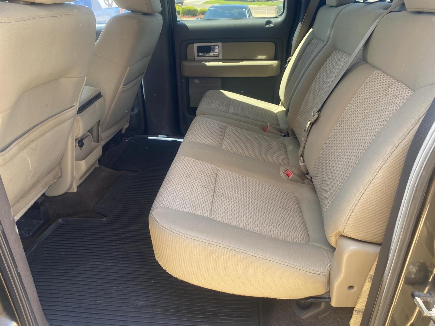 2009 BROWN FORD F-150 XLT (1FTRW12849K) , located at 922 W. Beacon St., Philadelphia, MS, 39350, (601) 650-3675, 32.770447, -89.127151 - Photo#13