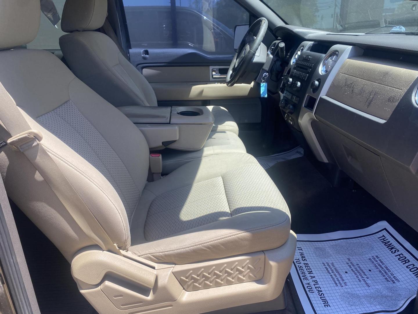 2009 BROWN FORD F-150 XLT (1FTRW12849K) , located at 922 W. Beacon St., Philadelphia, MS, 39350, (601) 650-3675, 32.770447, -89.127151 - Photo#10