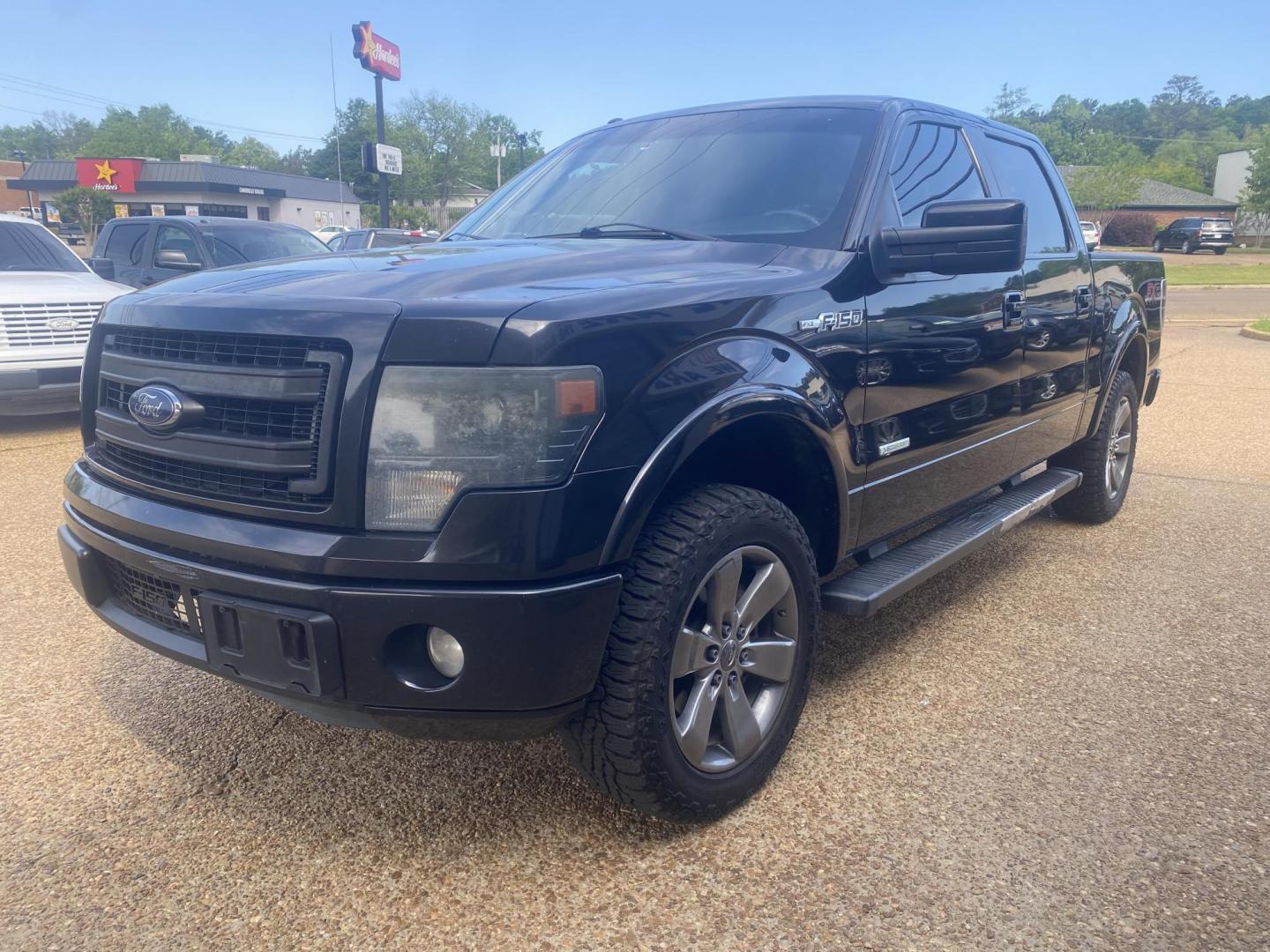 2014 BLACK FORD F-150 FX2 (1FTFW1CT1EK) , located at 922 W. Beacon St., Philadelphia, MS, 39350, (601) 650-3675, 32.770447, -89.127151 - Photo#2