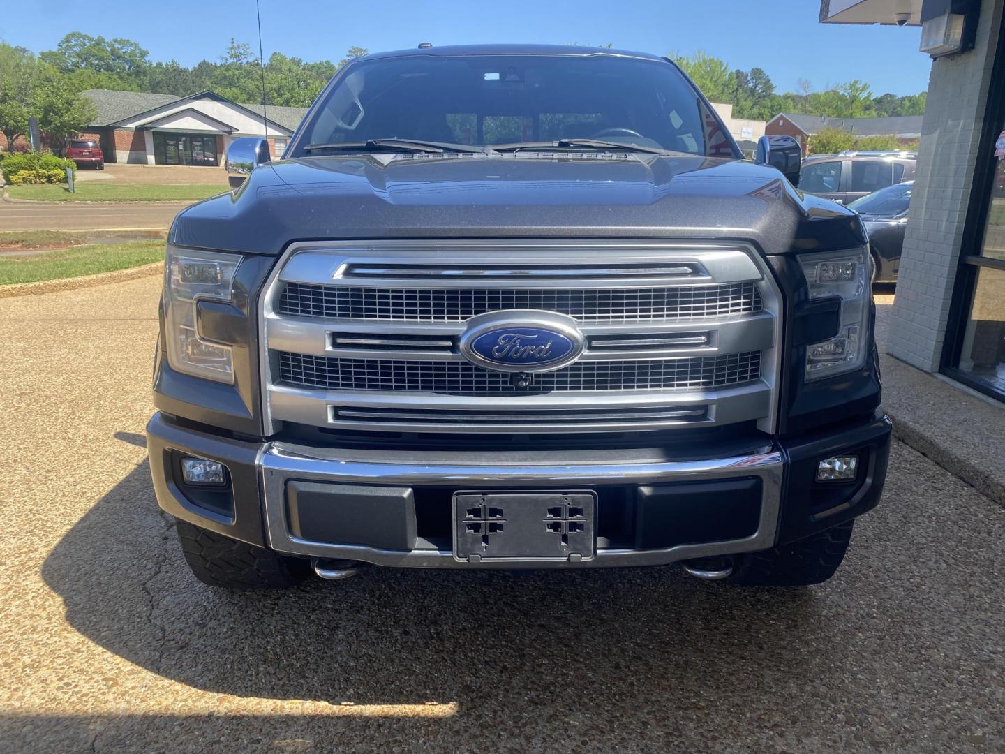 2017 BLACK FORD F-150 PLATINUM (1FTEW1EG7HF) , located at 922 W. Beacon St., Philadelphia, MS, 39350, (601) 650-3675, 32.770447, -89.127151 - Photo#1