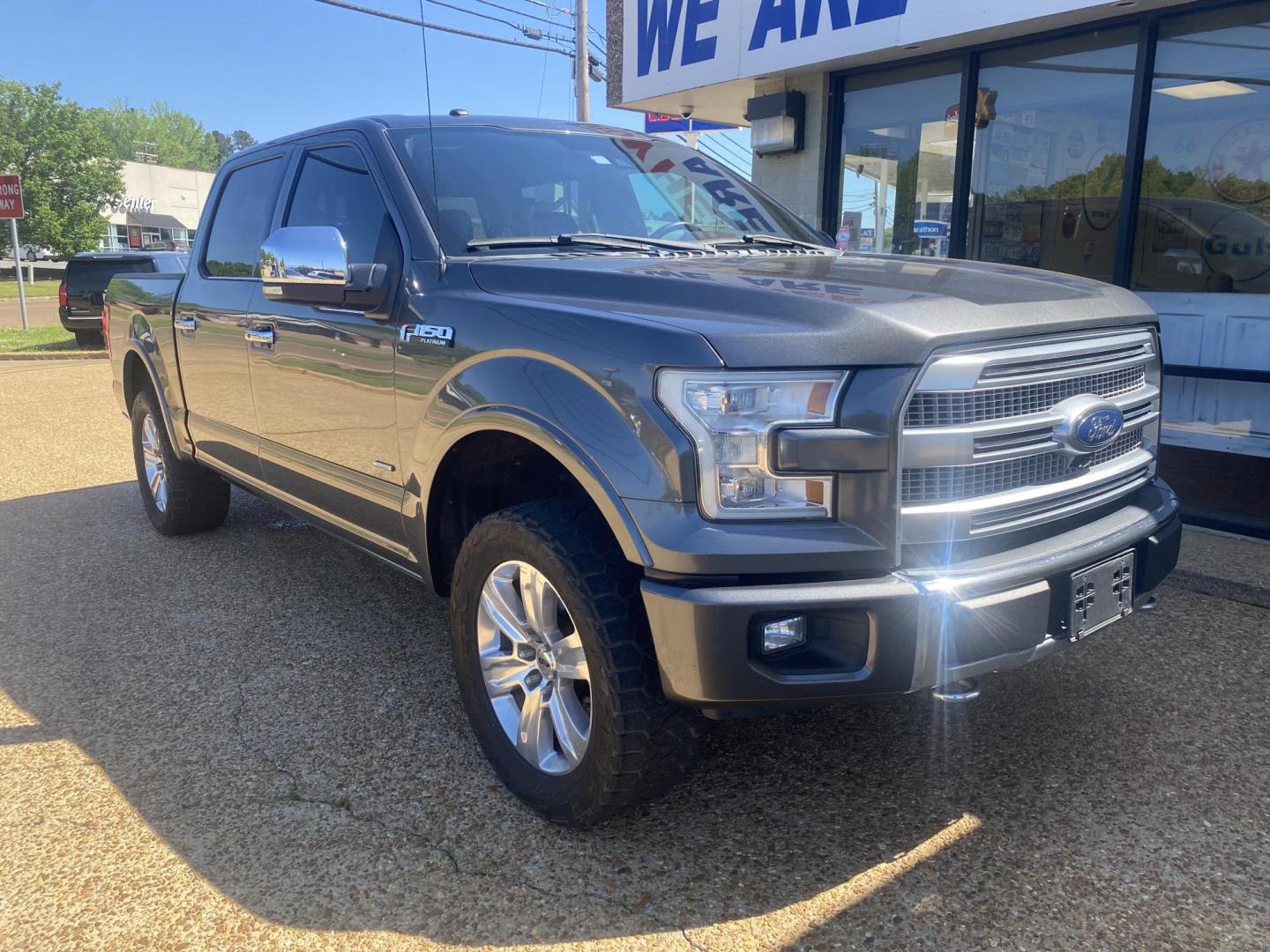 2017 BLACK FORD F-150 PLATINUM (1FTEW1EG7HF) , located at 922 W. Beacon St., Philadelphia, MS, 39350, (601) 650-3675, 32.770447, -89.127151 - Photo#0