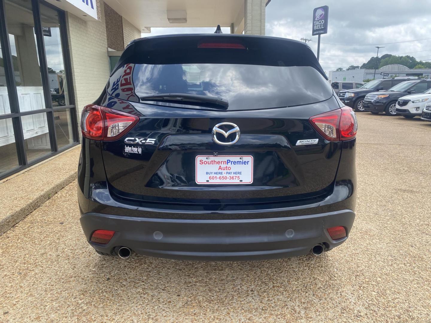 2014 BLACK MAZDA CX-5 SPORT (JM3KE2BE6E0) , located at 922 W. Beacon St., Philadelphia, MS, 39350, (601) 650-3675, 32.770447, -89.127151 - Photo#4