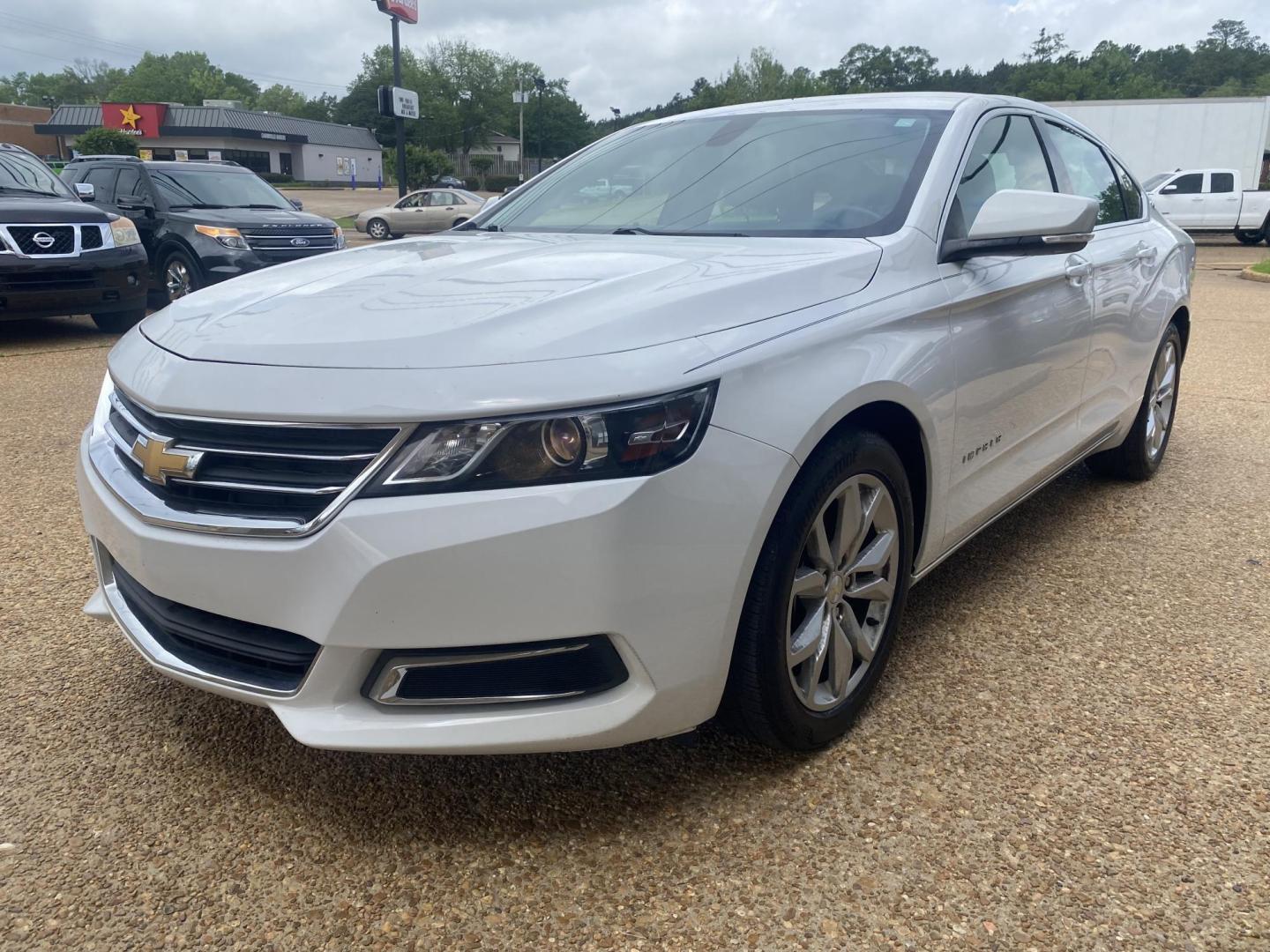 2016 WHITE CHEVROLET IMPALA LT (1LT) (2G1105SA4G9) , located at 922 W. Beacon St., Philadelphia, MS, 39350, (601) 650-3675, 32.770447, -89.127151 - Photo#2