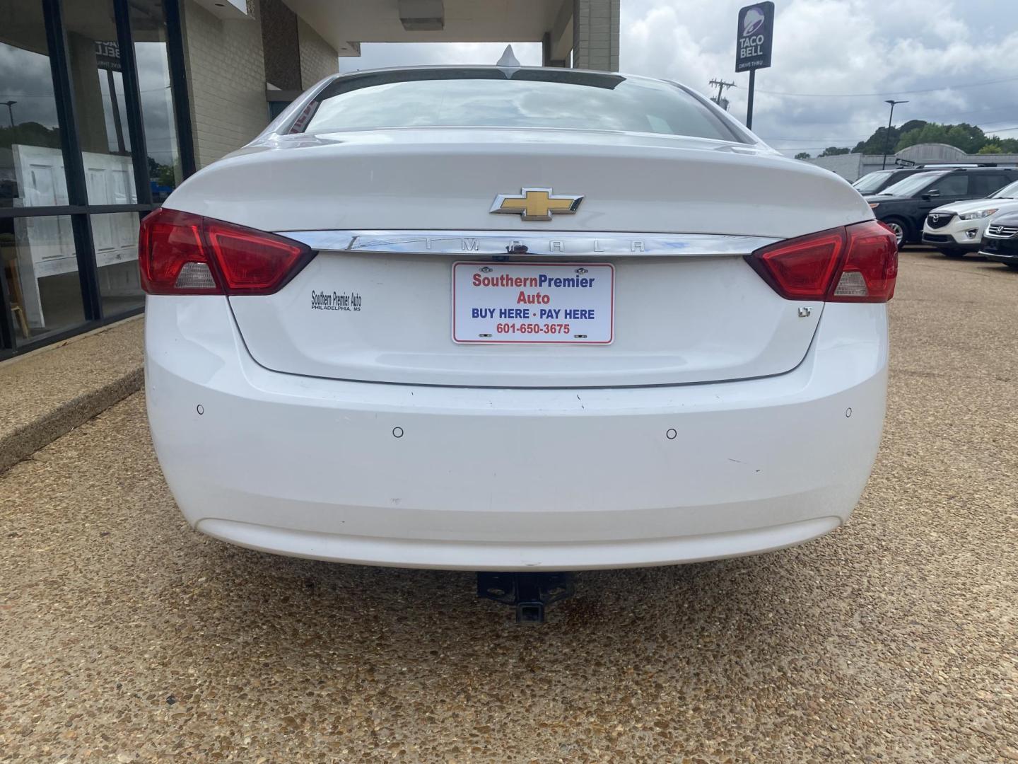 2016 WHITE CHEVROLET IMPALA LT (1LT) (2G1105SA4G9) , located at 922 W. Beacon St., Philadelphia, MS, 39350, (601) 650-3675, 32.770447, -89.127151 - Photo#4