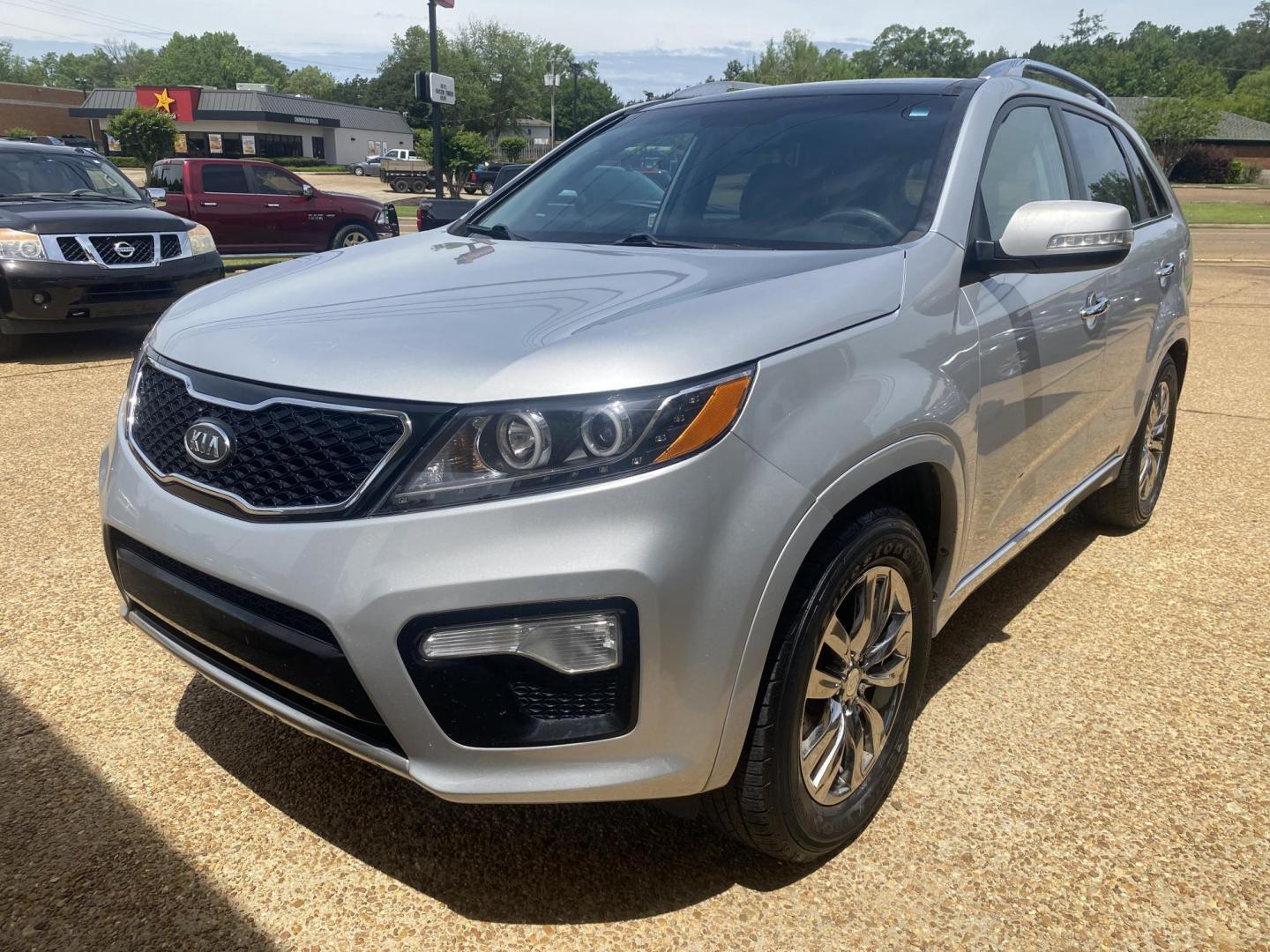 2013 SILVER KIA SORENTO SX (5XYKW4A23DG) , located at 922 W. Beacon St., Philadelphia, MS, 39350, (601) 650-3675, 32.770447, -89.127151 - Photo#2