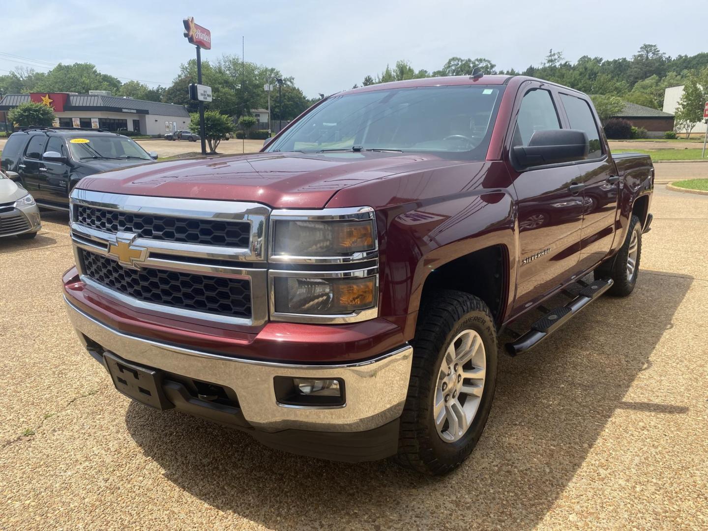 2014 RED CHEVROLET SILVERADO LT (3GCUKREC1EG) , located at 922 W. Beacon St., Philadelphia, MS, 39350, (601) 650-3675, 32.770447, -89.127151 - Photo#2