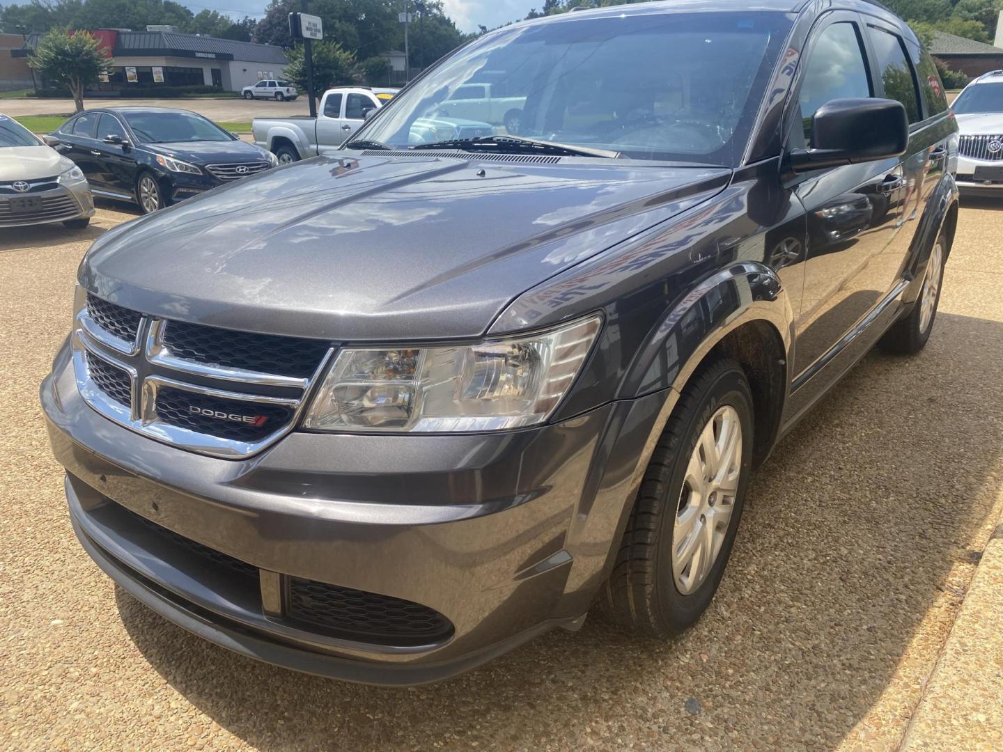 2017 BLACK DODGE JOURNEY SE (3C4PDCAB7HT) , located at 922 W. Beacon St., Philadelphia, MS, 39350, (601) 650-3675, 32.770447, -89.127151 - Photo#2