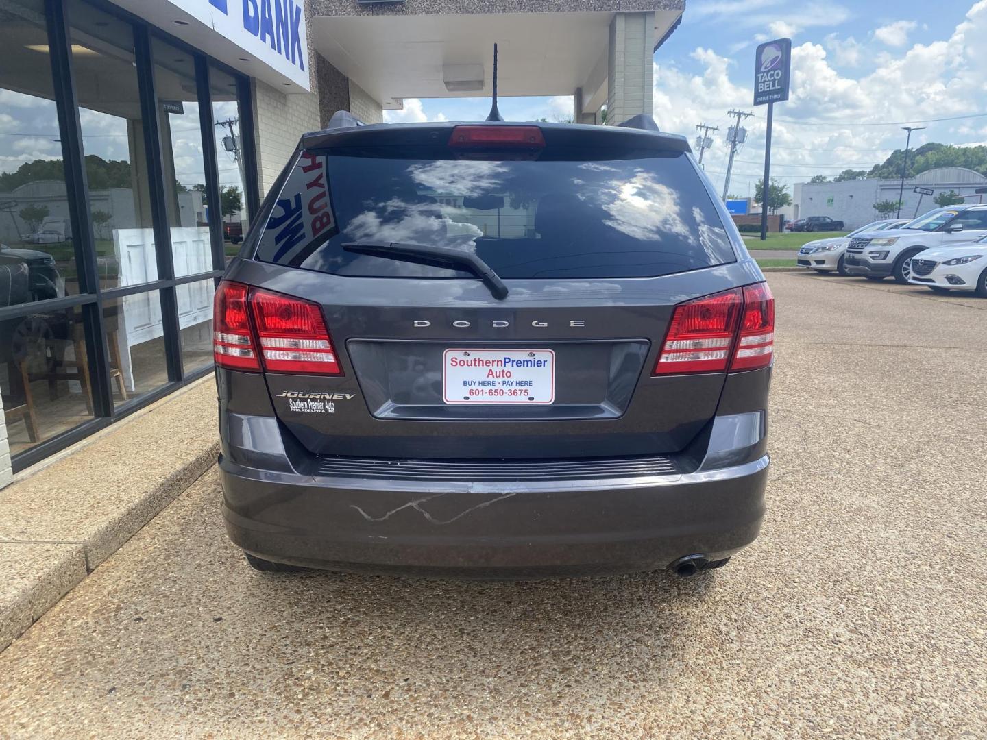 2017 BLACK DODGE JOURNEY SE (3C4PDCAB7HT) , located at 922 W. Beacon St., Philadelphia, MS, 39350, (601) 650-3675, 32.770447, -89.127151 - Photo#4