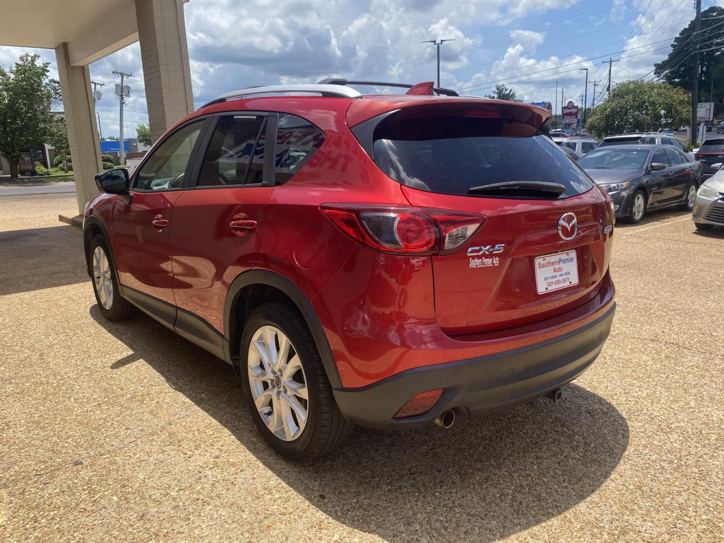2014 RED MAZDA CX-5 GRAND TOURING (JM3KE2DY5E0) , located at 922 W. Beacon St., Philadelphia, MS, 39350, (601) 650-3675, 32.770447, -89.127151 - Photo#3