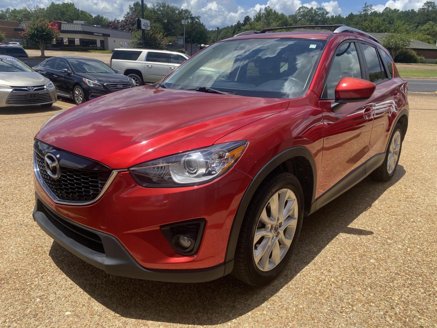 2014 RED MAZDA CX-5 GRAND TOURING (JM3KE2DY5E0) , located at 922 W. Beacon St., Philadelphia, MS, 39350, (601) 650-3675, 32.770447, -89.127151 - Photo#2