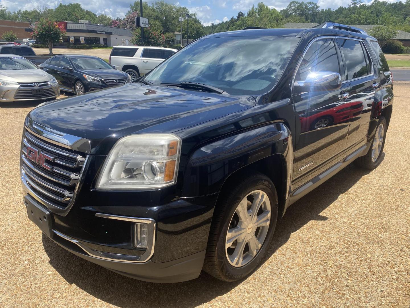 2017 BLACK GMC TERRAIN SLT (2GKALPEK6H6) , located at 922 W. Beacon St., Philadelphia, MS, 39350, (601) 650-3675, 32.770447, -89.127151 - Photo#2