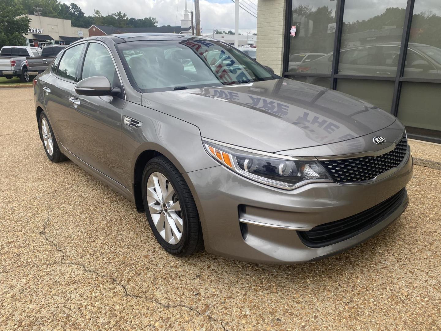 2016 GRAY KIA OPTIMA EX (5XXGU4L37GG) , located at 922 W. Beacon St., Philadelphia, MS, 39350, (601) 650-3675, 32.770447, -89.127151 - Photo#0