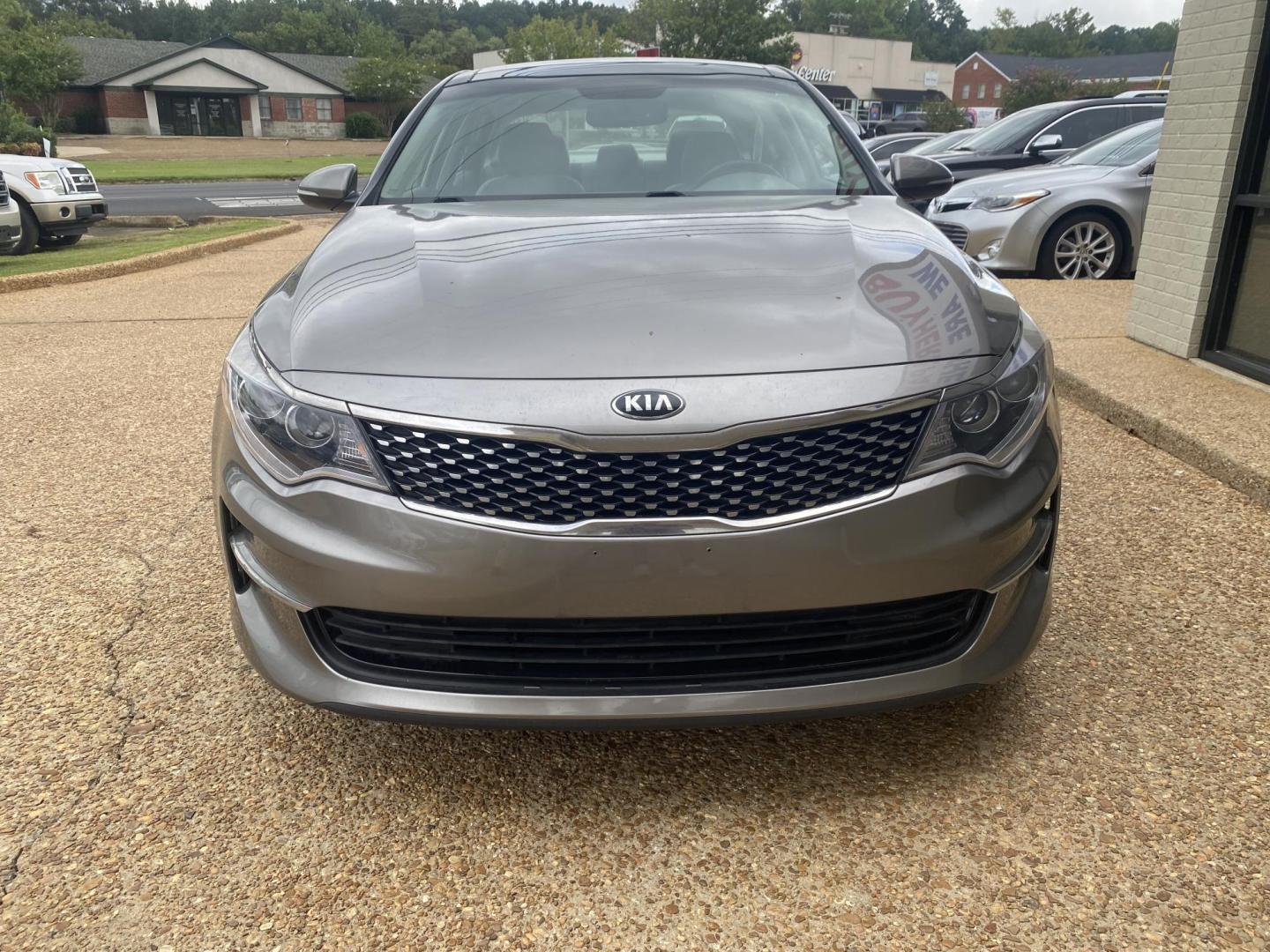 2016 GRAY KIA OPTIMA EX (5XXGU4L37GG) , located at 922 W. Beacon St., Philadelphia, MS, 39350, (601) 650-3675, 32.770447, -89.127151 - Photo#1