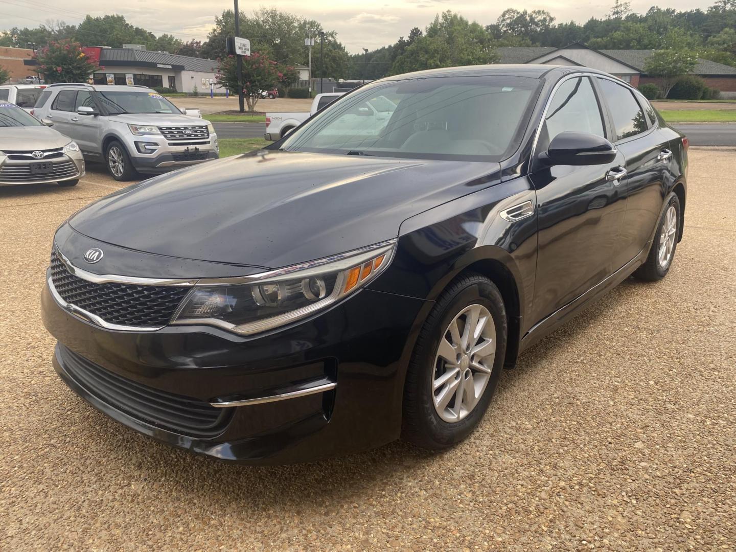 2017 BLACK KIA OPTIMA LX (5XXGT4L36HG) , located at 922 W. Beacon St., Philadelphia, MS, 39350, (601) 650-3675, 32.770447, -89.127151 - Photo#2
