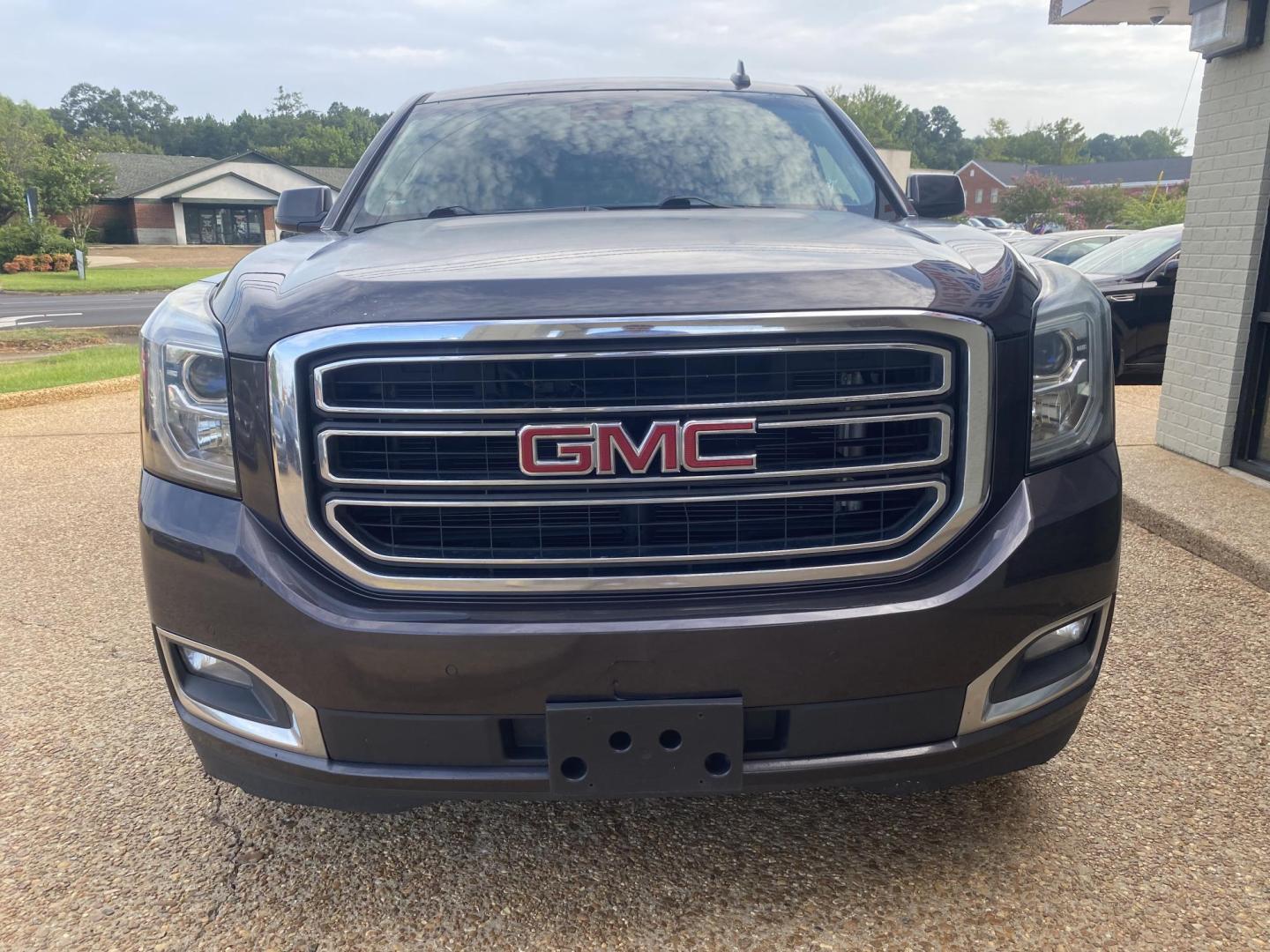 2017 GRAY GMC YUKON SLT (1GKS1BKC8HR) , located at 922 W. Beacon St., Philadelphia, MS, 39350, (601) 650-3675, 32.770447, -89.127151 - Photo#1