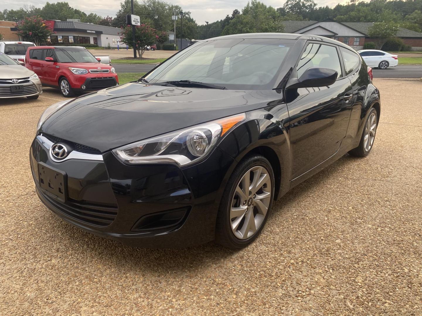 2016 BLACK HYUNDAI VELOSTER BASE (KMHTC6AD7GU) , located at 922 W. Beacon St., Philadelphia, MS, 39350, (601) 650-3675, 32.770447, -89.127151 - Photo#2