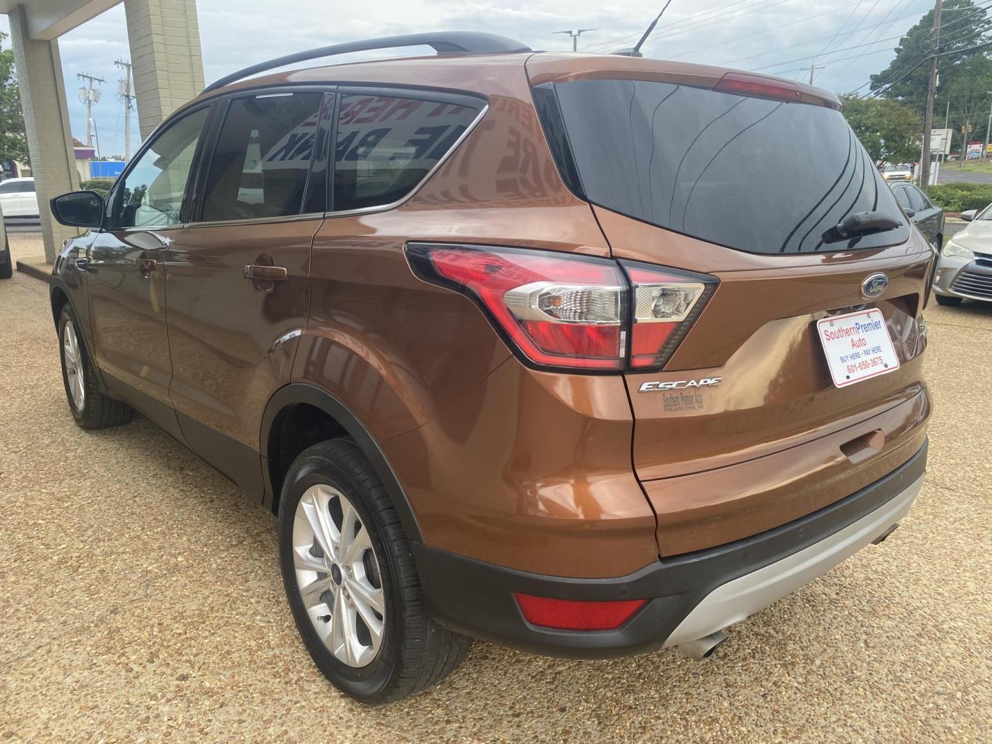 2017 ORANGE FORD ESCAPE SE (1FMCU0GD9HU) , located at 922 W. Beacon St., Philadelphia, MS, 39350, (601) 650-3675, 32.770447, -89.127151 - Photo#3