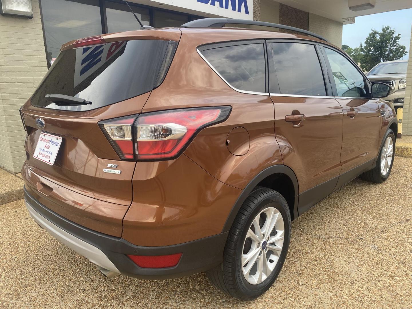 2017 ORANGE FORD ESCAPE SE (1FMCU0GD9HU) , located at 922 W. Beacon St., Philadelphia, MS, 39350, (601) 650-3675, 32.770447, -89.127151 - Photo#5
