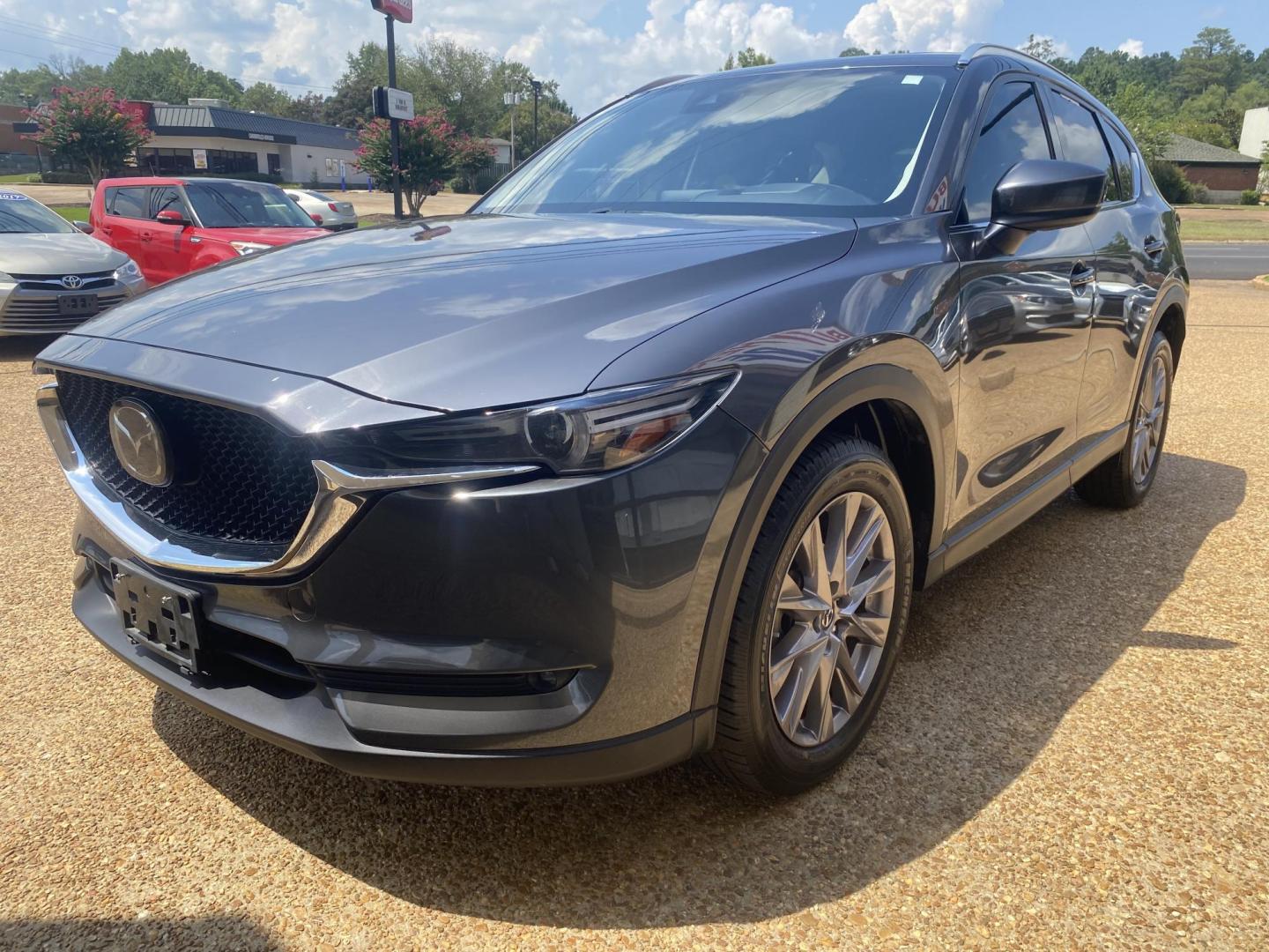 2019 GRAY MAZDA CX-5 GRAND TOURING (JM3KFADM7K1) , located at 922 W. Beacon St., Philadelphia, MS, 39350, (601) 650-3675, 32.770447, -89.127151 - Photo#2
