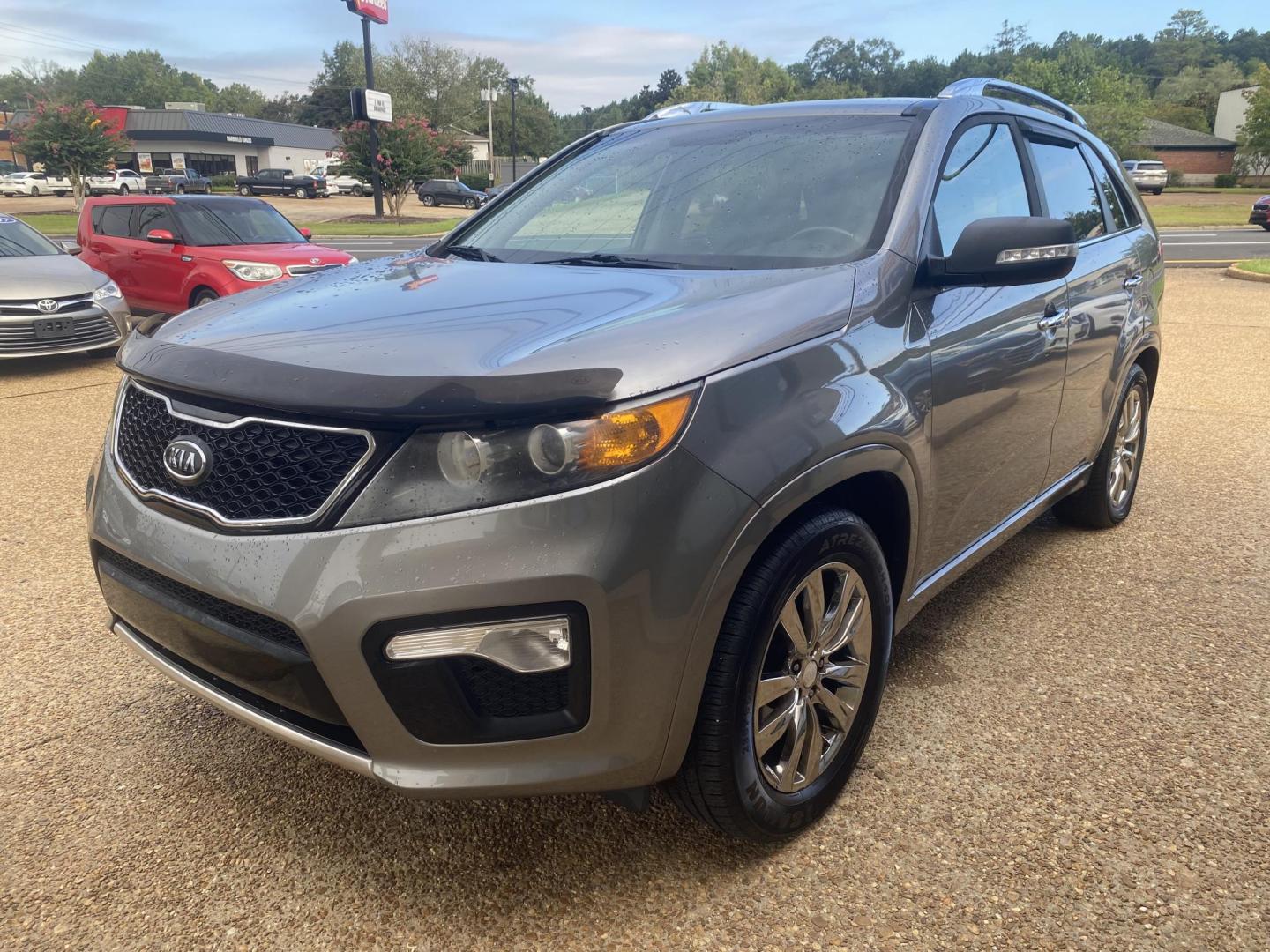 2013 SILVER KIA SORENTO SX (5XYKW4A29DG) , located at 922 W. Beacon St., Philadelphia, MS, 39350, (601) 650-3675, 32.770447, -89.127151 - Photo#2