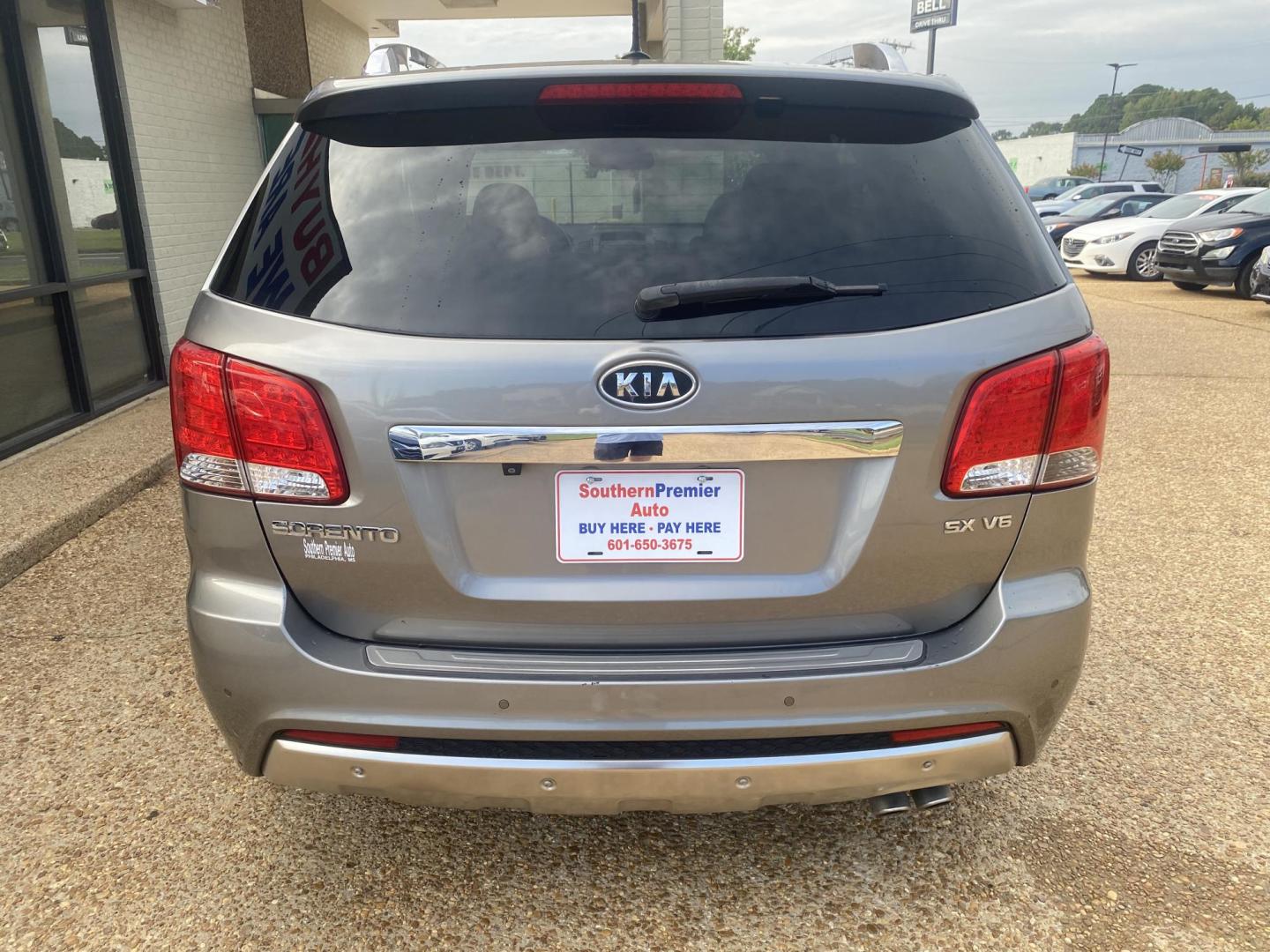 2013 SILVER KIA SORENTO SX (5XYKW4A29DG) , located at 922 W. Beacon St., Philadelphia, MS, 39350, (601) 650-3675, 32.770447, -89.127151 - Photo#4