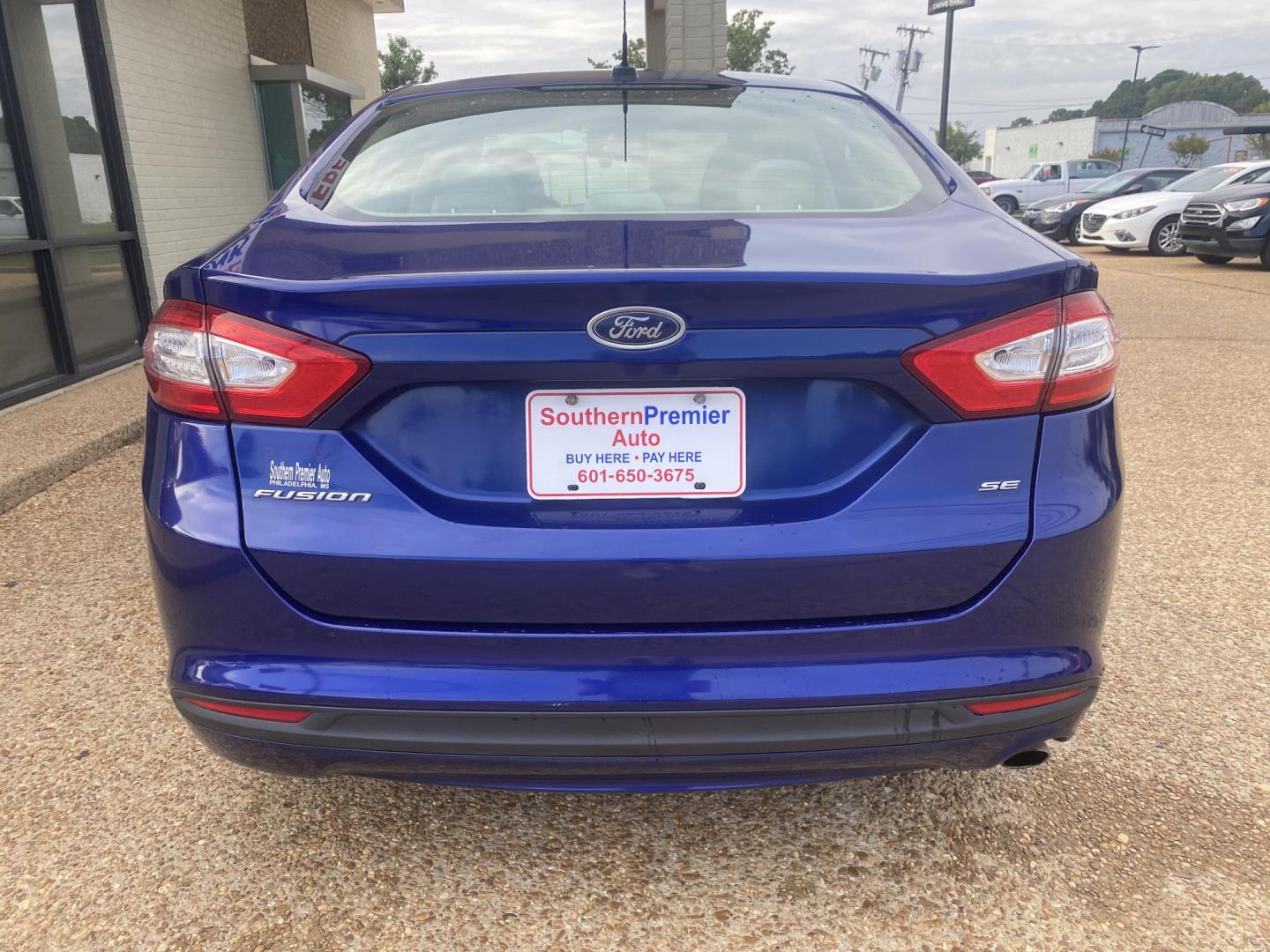 2014 BLUE FORD FUSION SE (1FA6P0H79E5) , located at 922 W. Beacon St., Philadelphia, MS, 39350, (601) 650-3675, 32.770447, -89.127151 - Photo#4