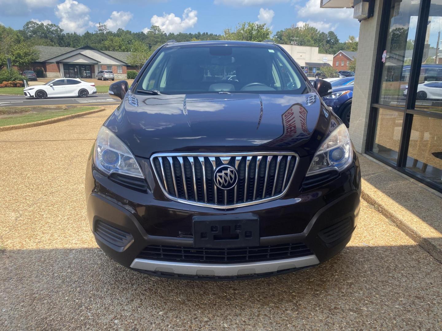 2016 BROWN BUICK ENCORE BASE (KL4CJASB9GB) , located at 922 W. Beacon St., Philadelphia, MS, 39350, (601) 650-3675, 32.770447, -89.127151 - Photo#1