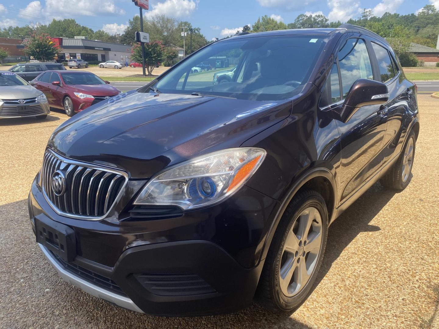 2016 BROWN BUICK ENCORE BASE (KL4CJASB9GB) , located at 922 W. Beacon St., Philadelphia, MS, 39350, (601) 650-3675, 32.770447, -89.127151 - Photo#2